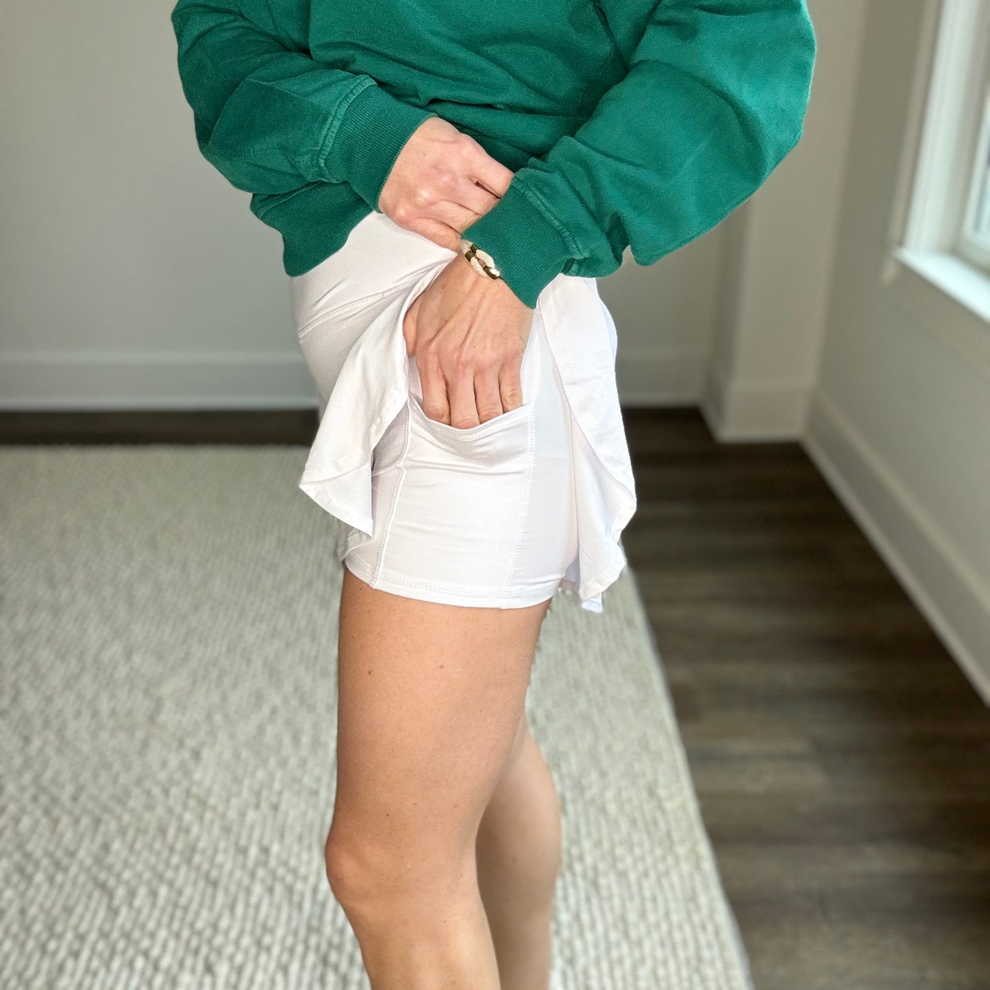 White butter soft v front knit high rise tennis and pickleball skirt with short liner