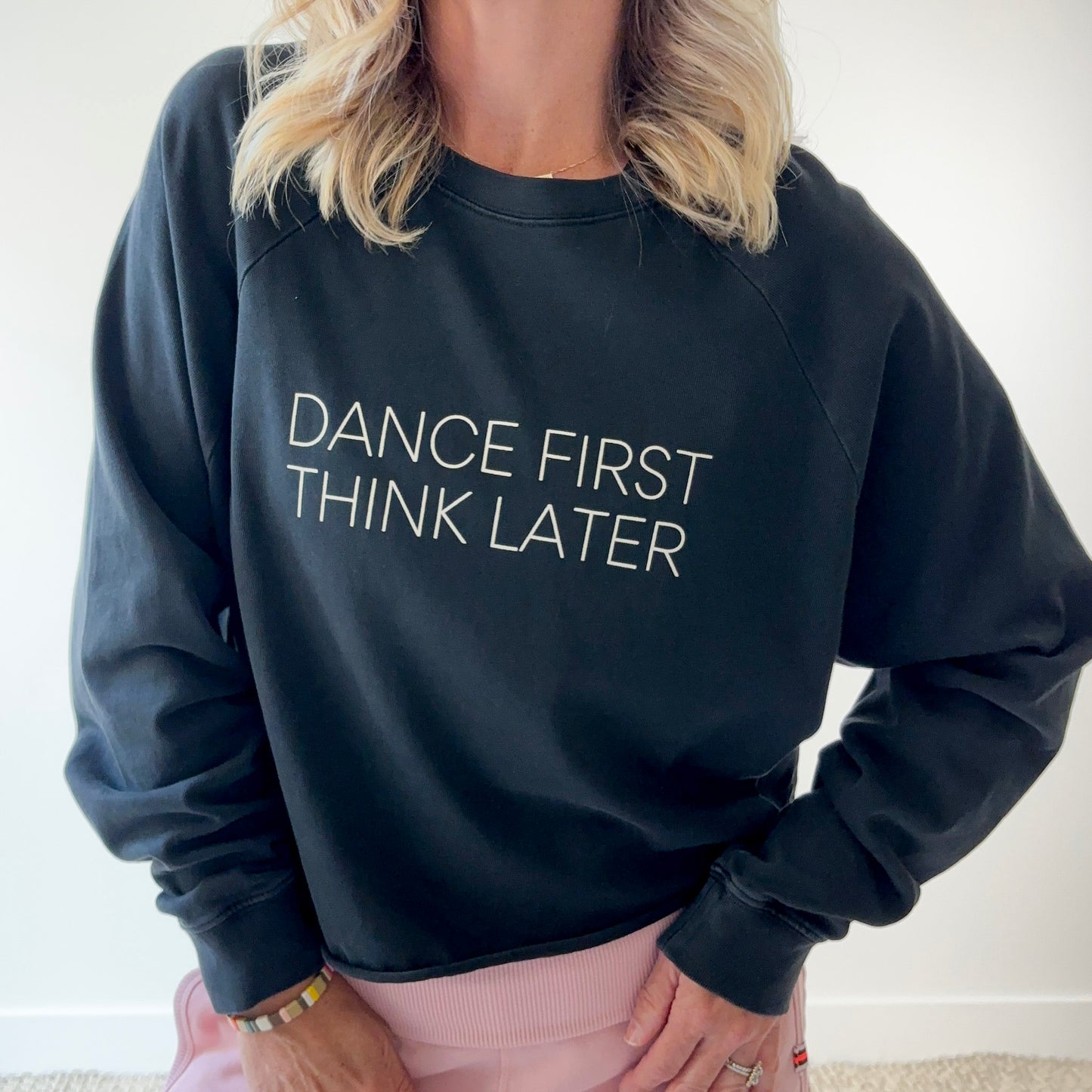 Women's black crewneck cropped heavyweight raglan sleeve t shirt with ivory dance first think later chest graphic