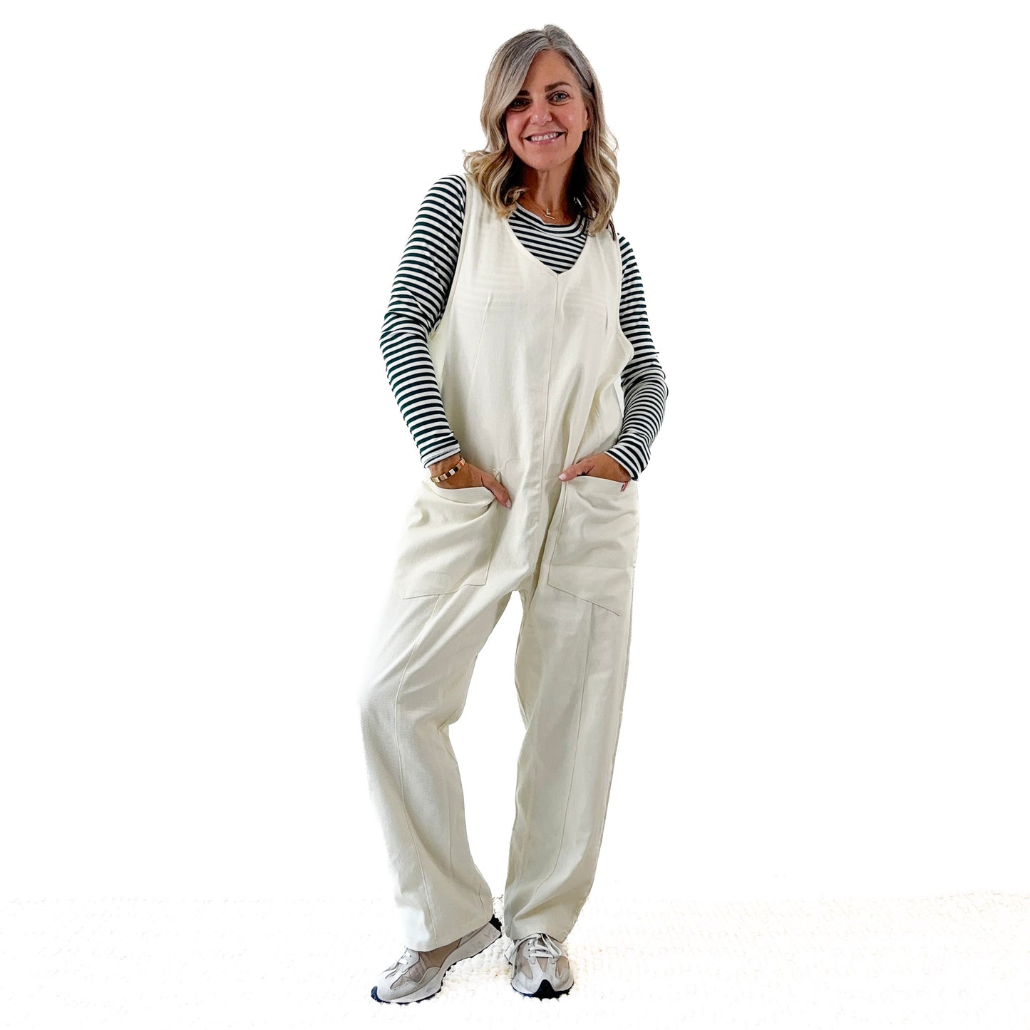 Women's Ivory Front Seam Pull on woven jumpsuit with front pockets