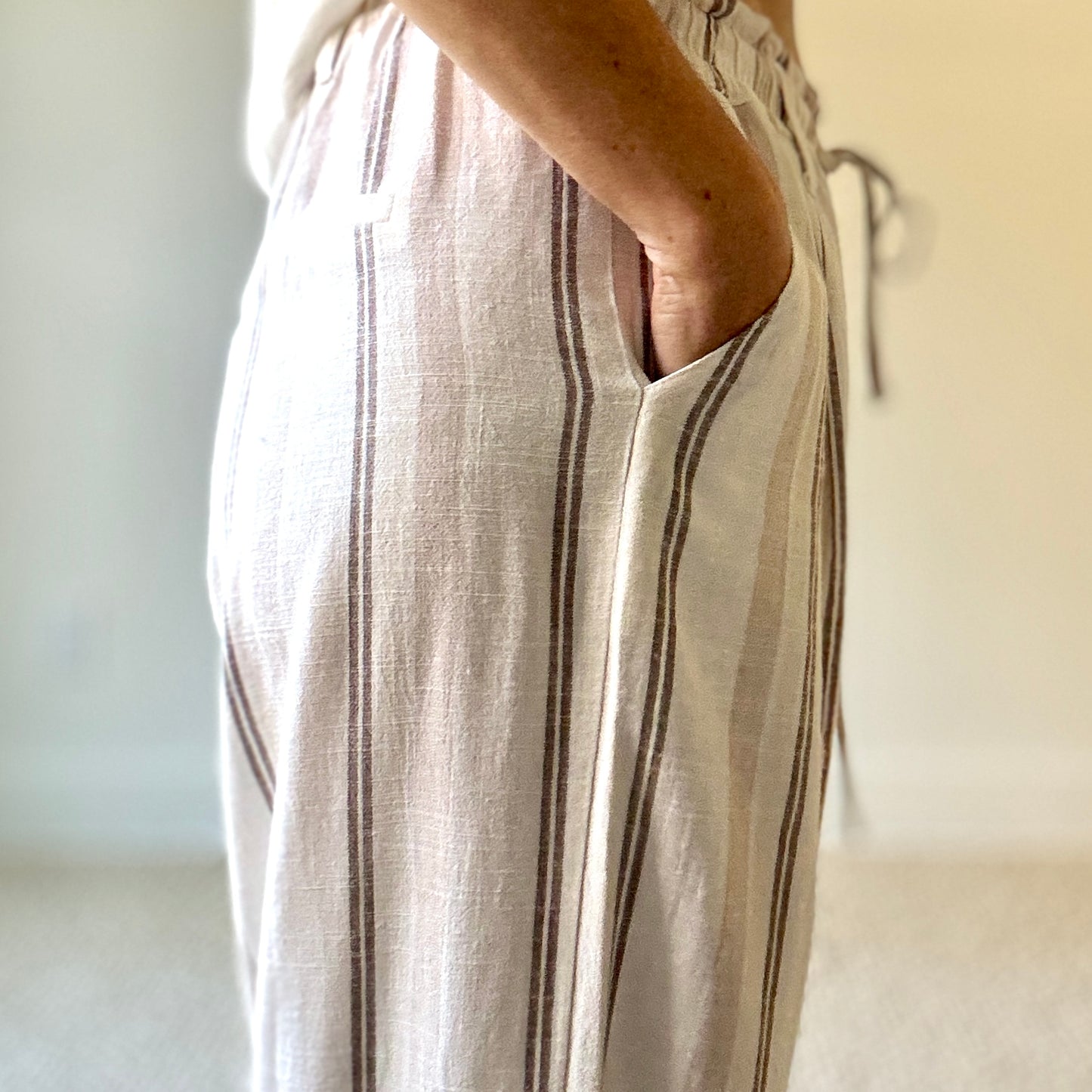 Women's white and tan striped smocked waist pull on pant with drawcord and pockets