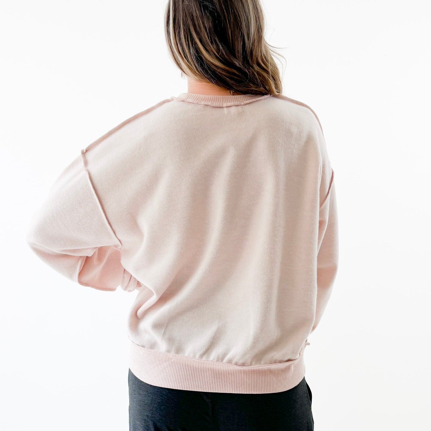 Women's light pink exposed seem crewneck sweatshirt with but first mimosas neon pink left chest embroidery