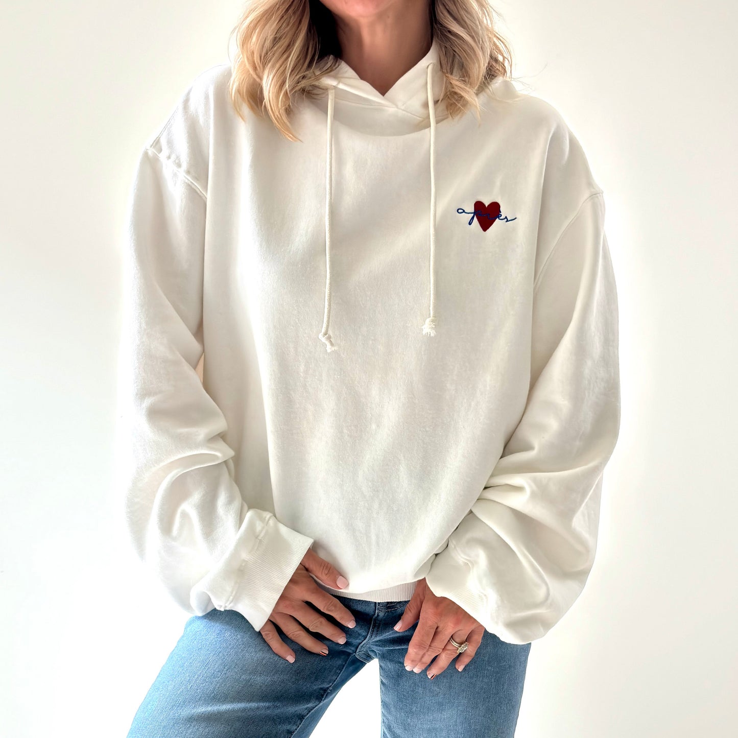 Women's ivory pullover hooded oversized light weight fleece sweatshirt with script après and heart embroidery
