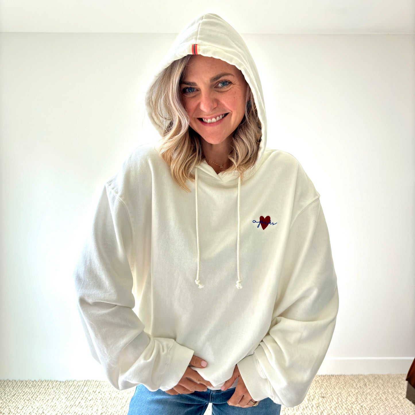 Women's ivory pullover hooded oversized light weight fleece sweatshirt with script après and heart embroidery