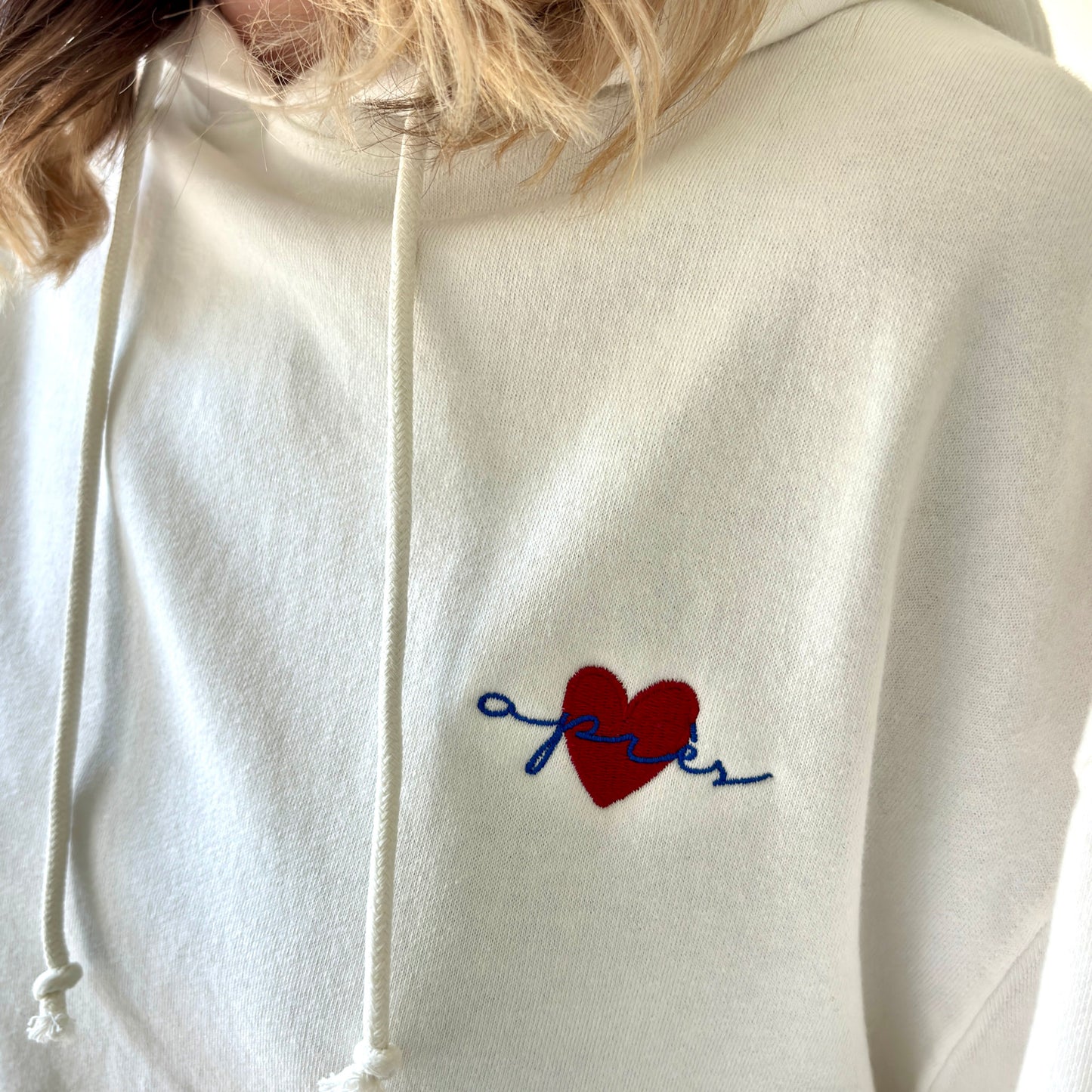 Women's ivory pullover hooded oversized light weight fleece sweatshirt with script après and heart embroidery