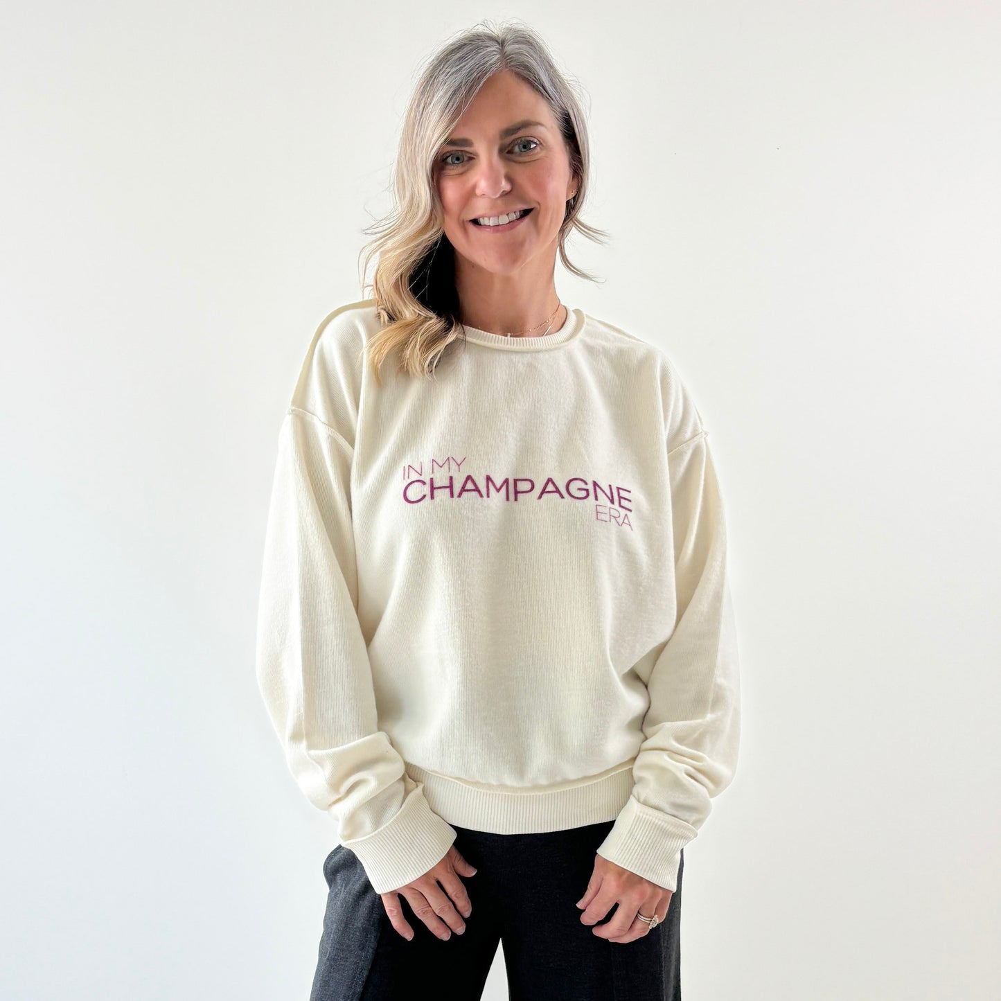 Women's Ivory fuzzy exposed seem crewneck sweatshirt with burgandy In My Champagne Era print