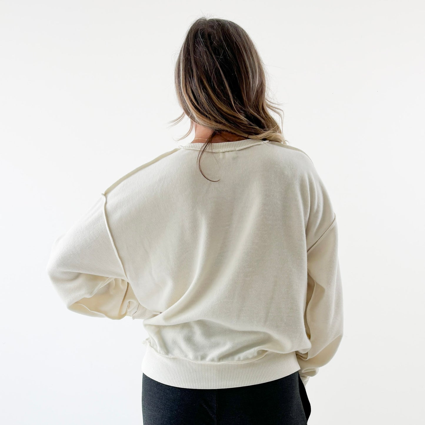 Women's Ivory fuzzy exposed seem crewneck sweatshirt with burgandy In My Champagne Era print