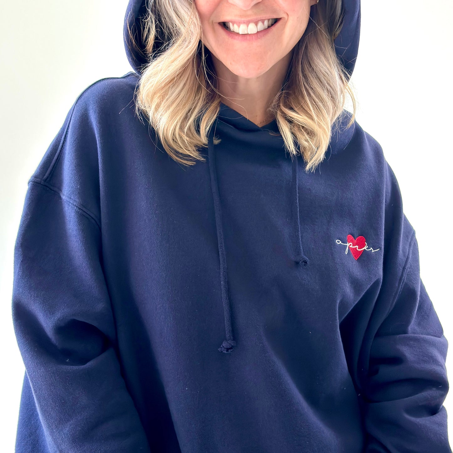 Women's navy pullover hooded oversized light weight fleece sweatshirt with script après and heart embroidery