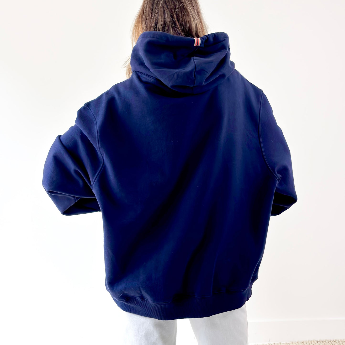 Women's navy pullover hooded oversized light weight fleece sweatshirt with script après and heart embroidery