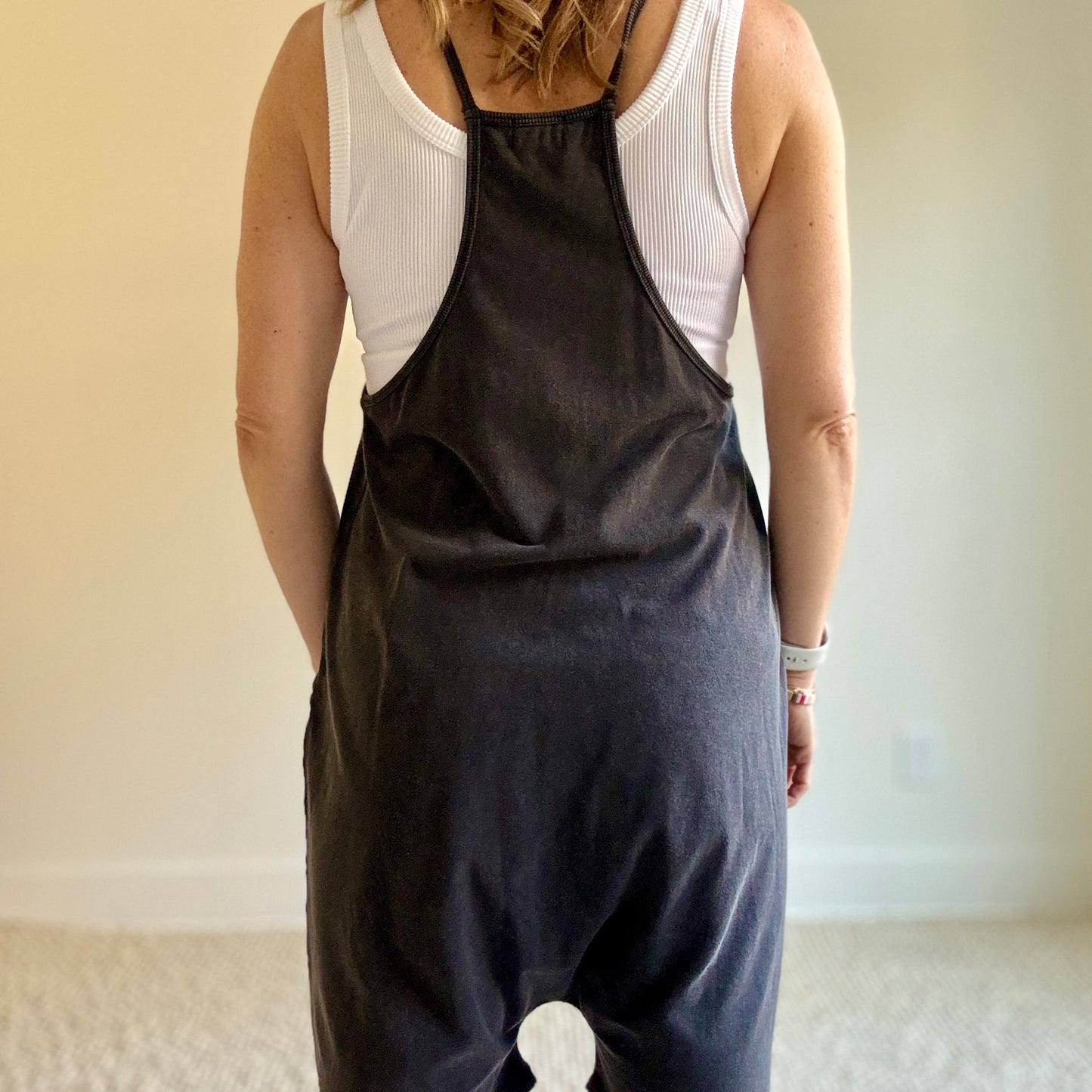 Women's washed black easy knit short romper with pockets