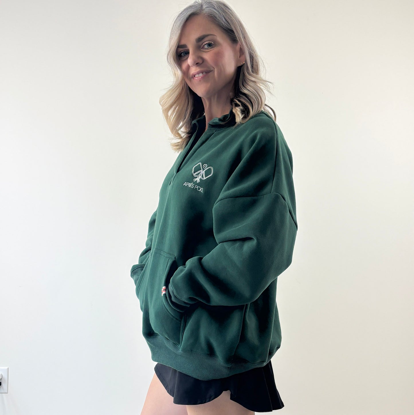 Heather oatmeal oversized collared sweatshirt with après pckl pickleball paddle embroidery