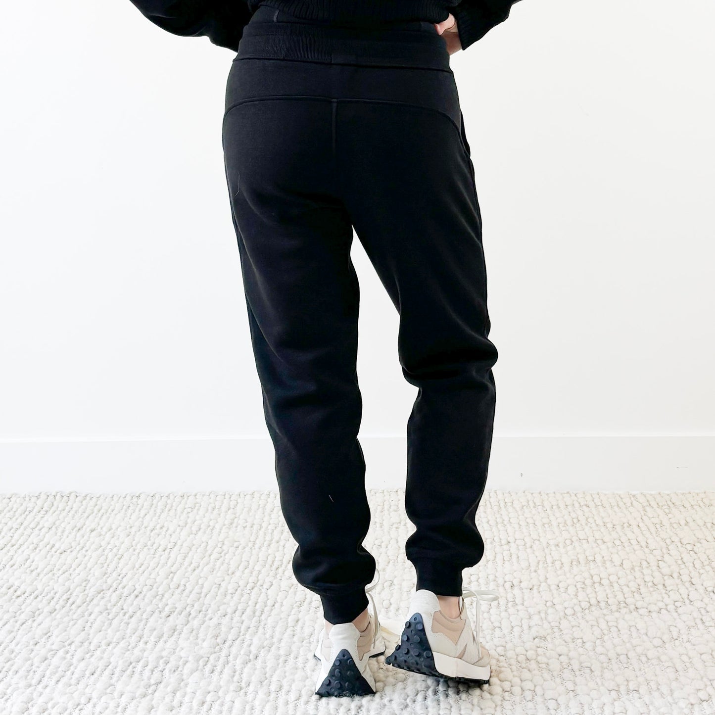 Women's black slim fit fleece jogger with just here for the après embroidery