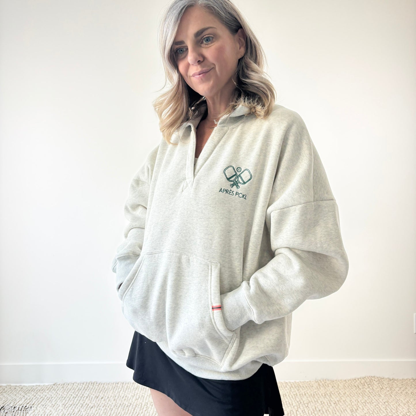 Heather oatmeal oversized collared sweatshirt with après pckl pickleball paddle embroidery