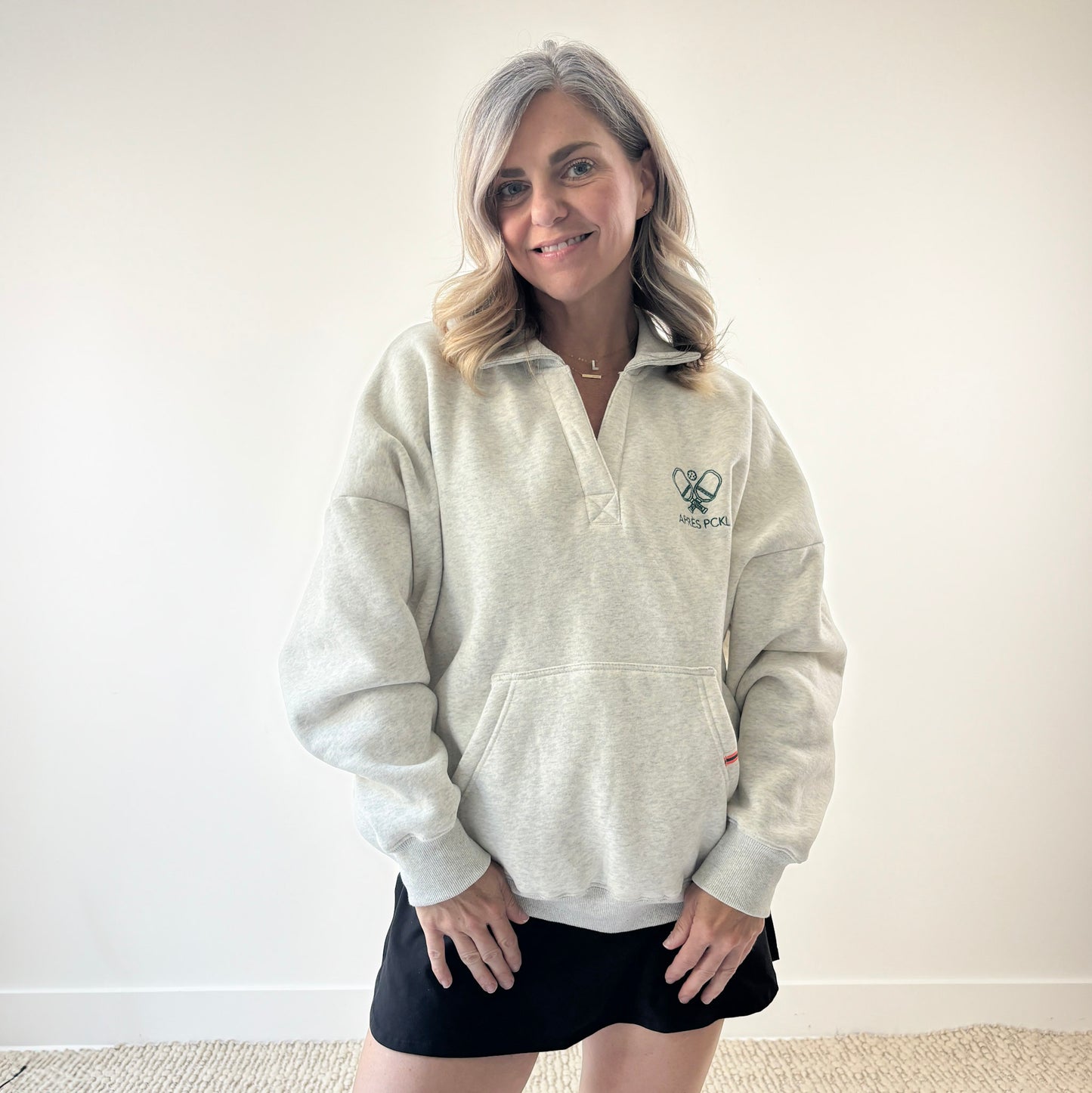 Heather oatmeal oversized collared sweatshirt with après pckl pickleball paddle embroidery