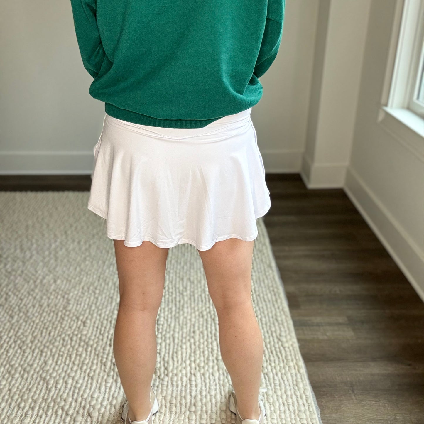 White butter soft v front knit high rise tennis and pickleball skirt with short liner