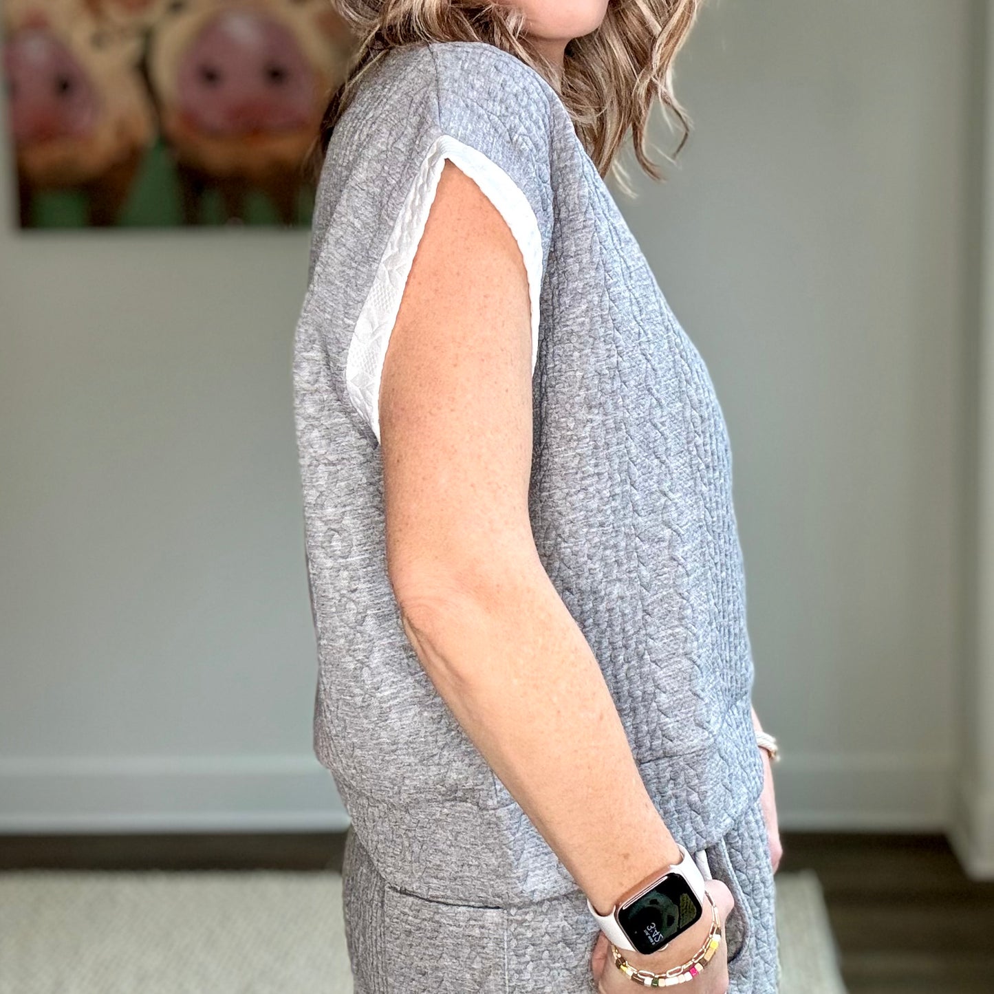 Heather grey cable knit textured cap sleeve top with white tipping at neck and armholes