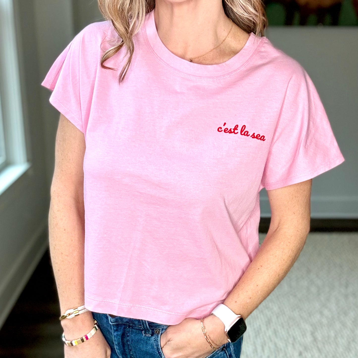 Pink short sleeve ultra soft tee with red c'est la sea left chest graphic