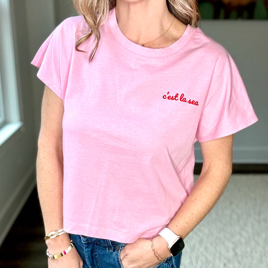 Pink short sleeve ultra soft tee with red c'est la sea left chest graphic