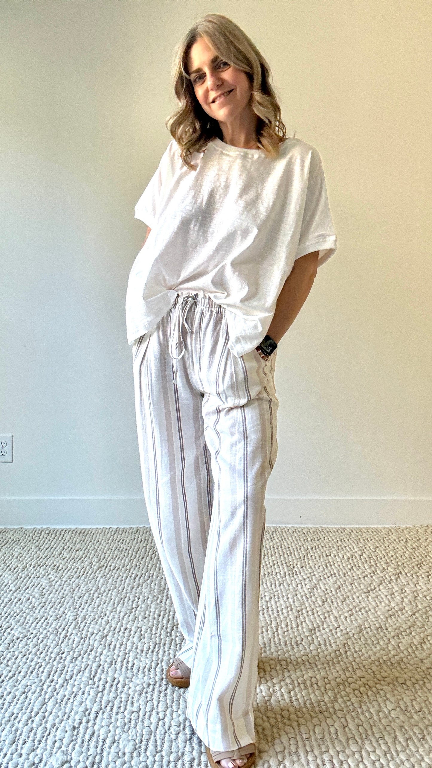 Women's white and tan striped smocked waist pull on pant with drawcord and pockets