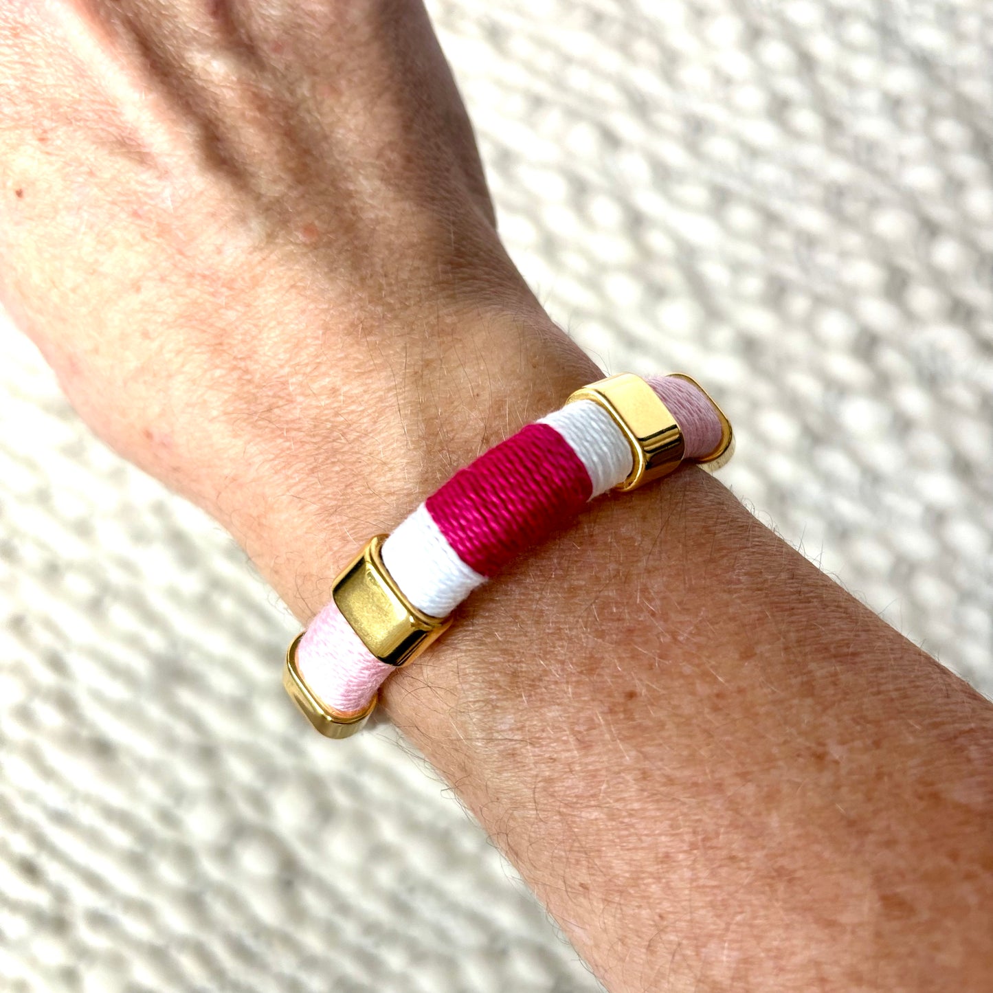 Hot pink white and light pink wrapped cord and rope bracelet with gold hardware