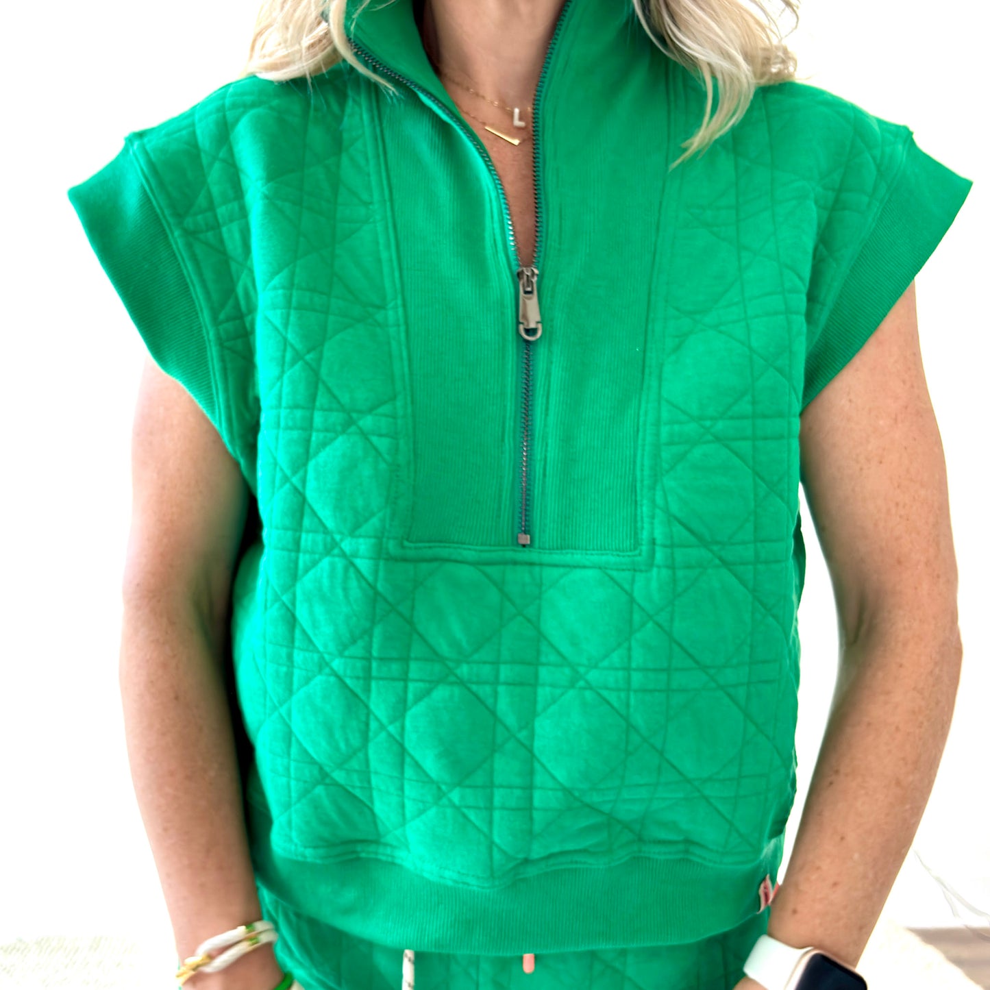 Women's kelly green textured quart zip pull over top with rib trim