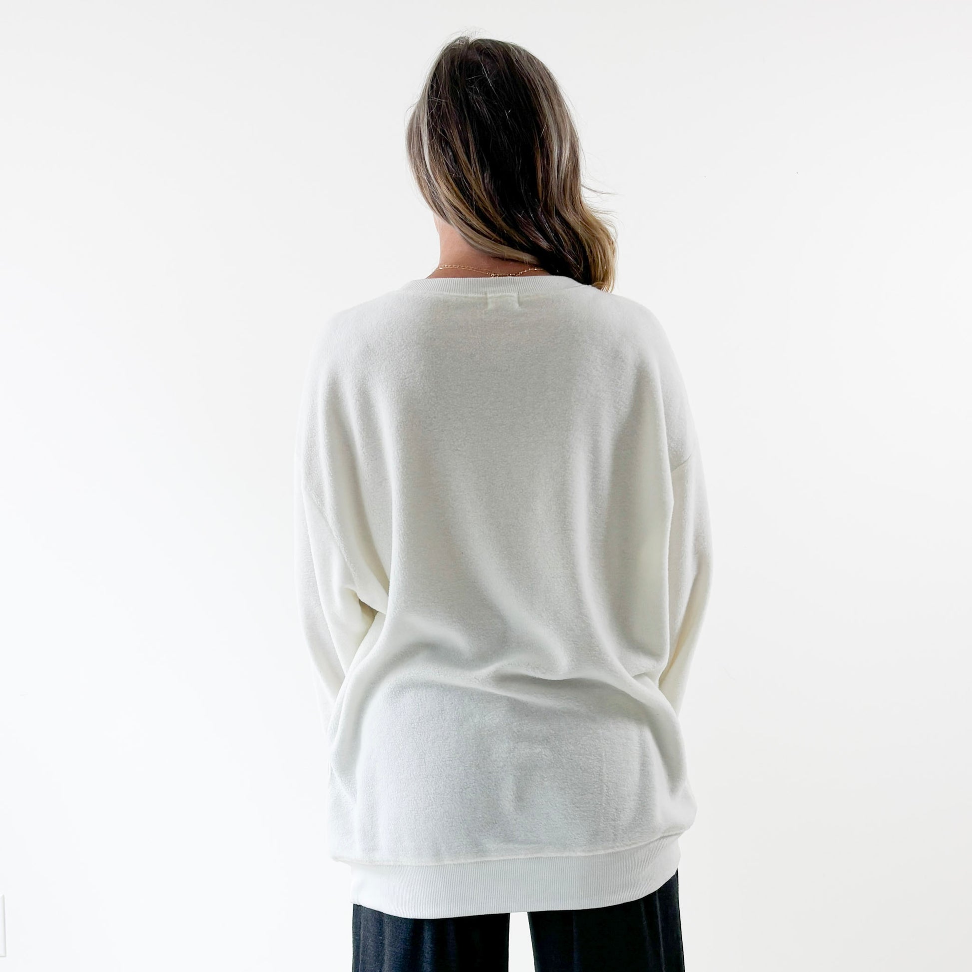 Women's ivory crewneck fuzzy tunic length sweatshirt with charcoal grey printed chardonnay is the answer graphic