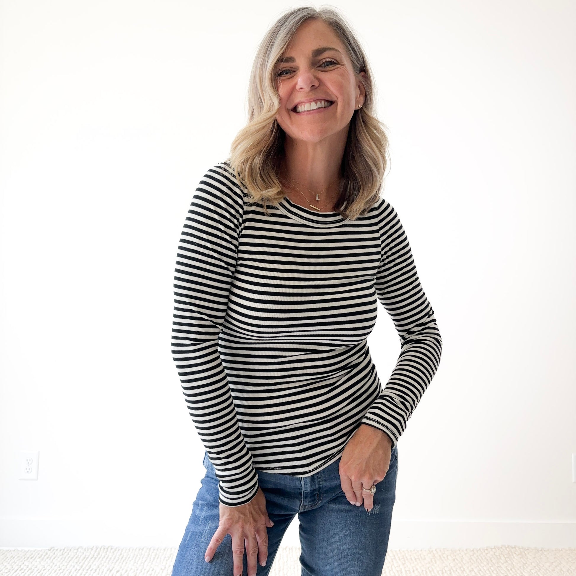 Women's long sleeve fitted black and white stripe crew neck top