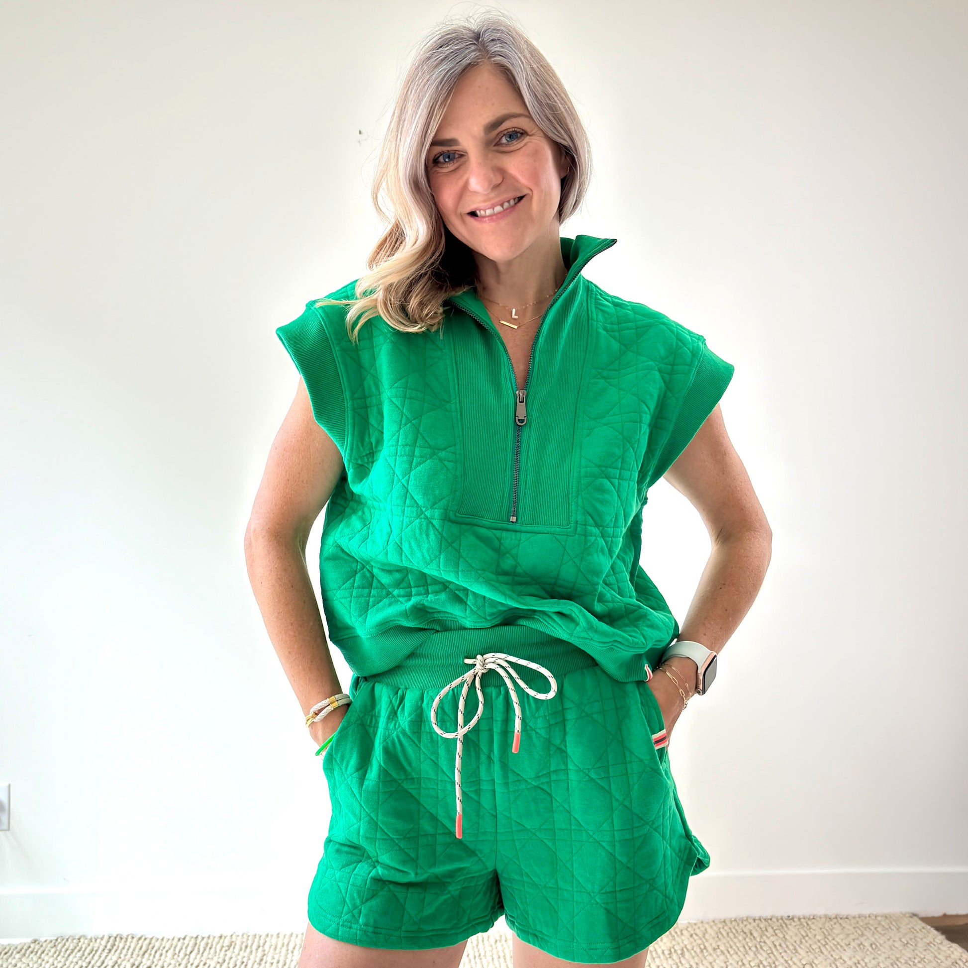 Women's kelly green textured quart zip pull over top with rib trim