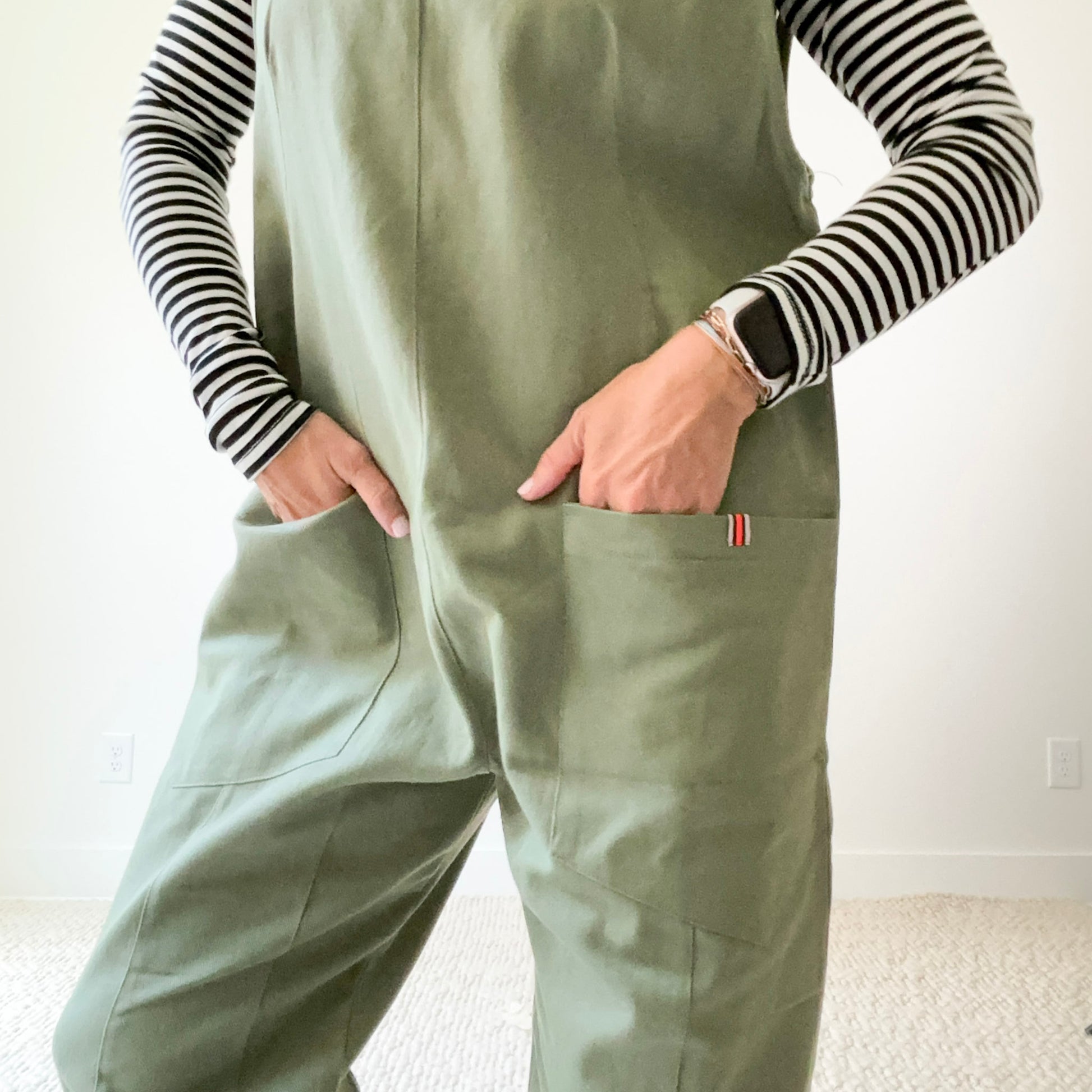 Women's Olive Front Seam Pull on woven jumpsuit with front pockets
