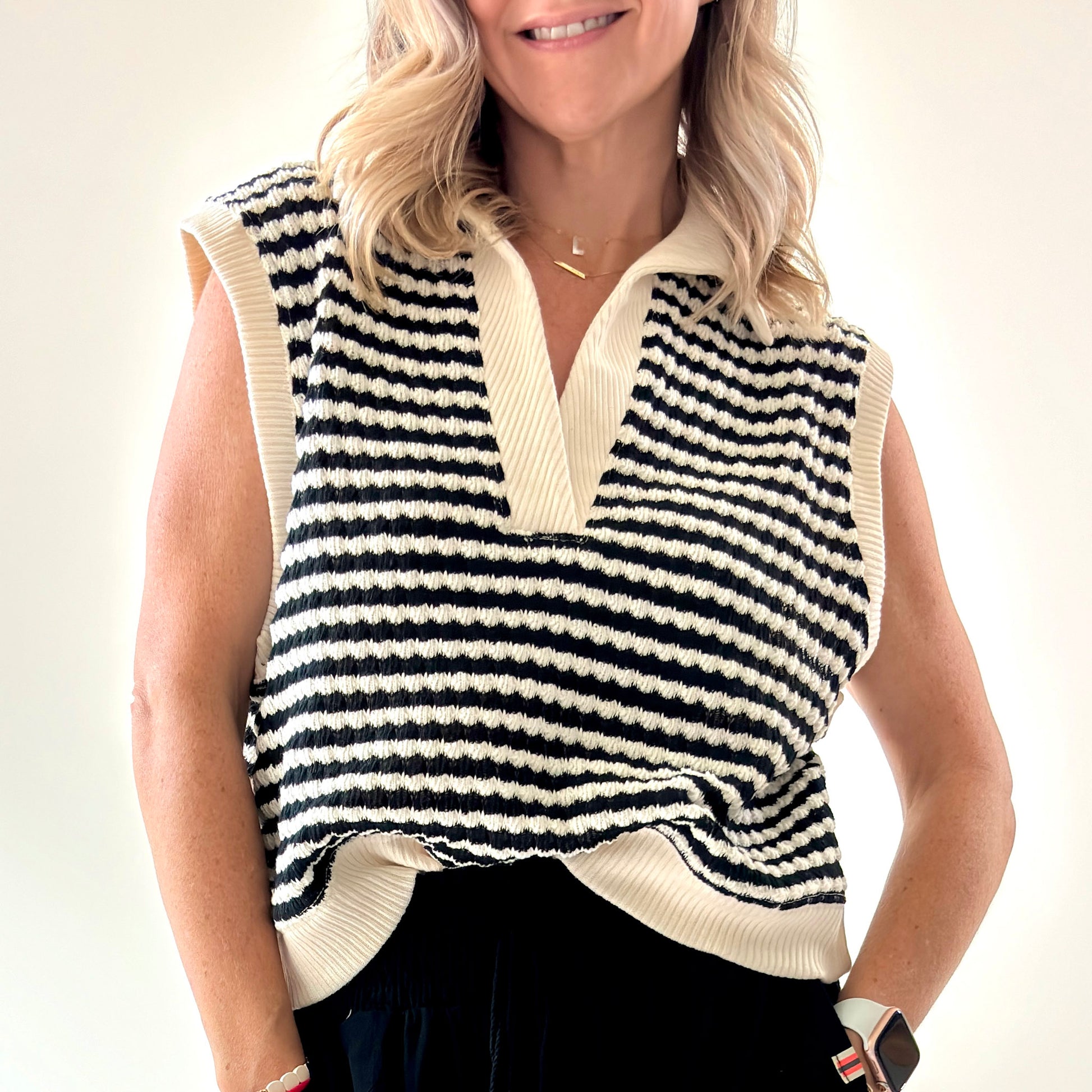 Black and ivory crochet textured sleeveless sweater vest