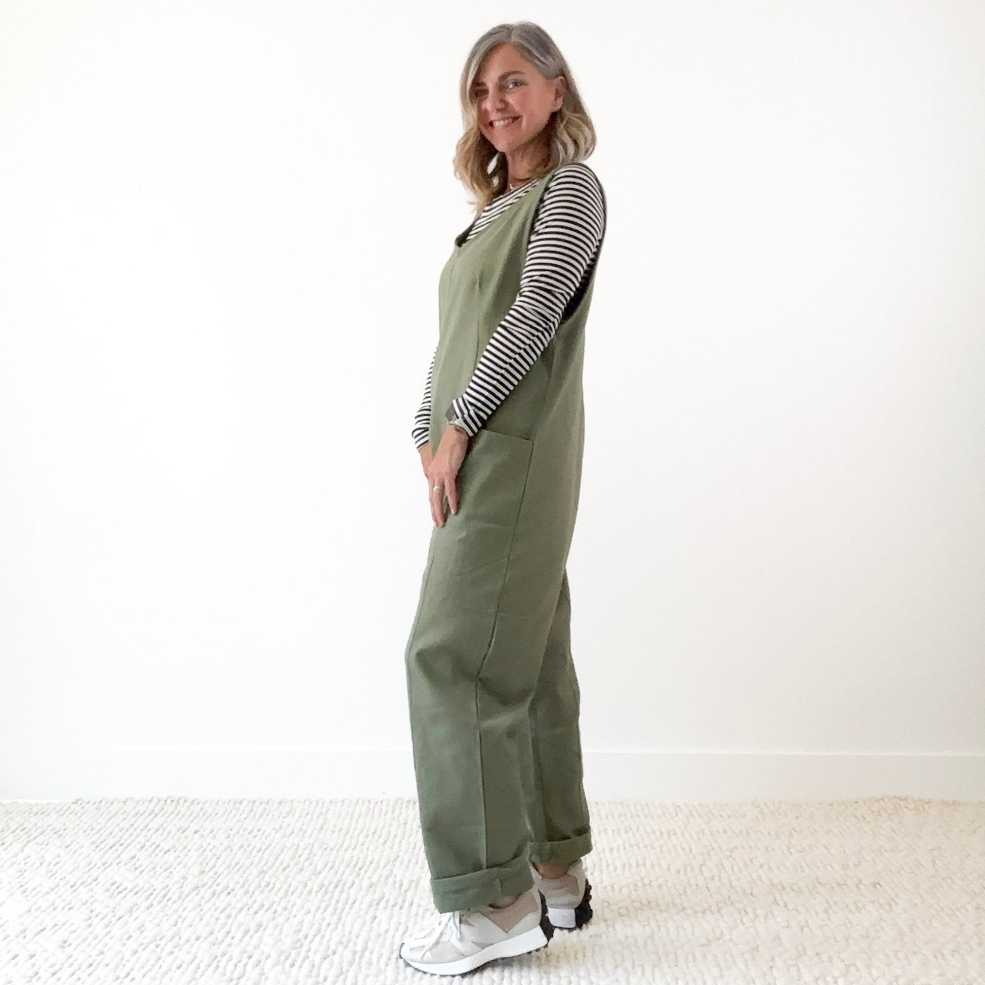 Women's Olive Front Seam Pull on woven jumpsuit with front pockets