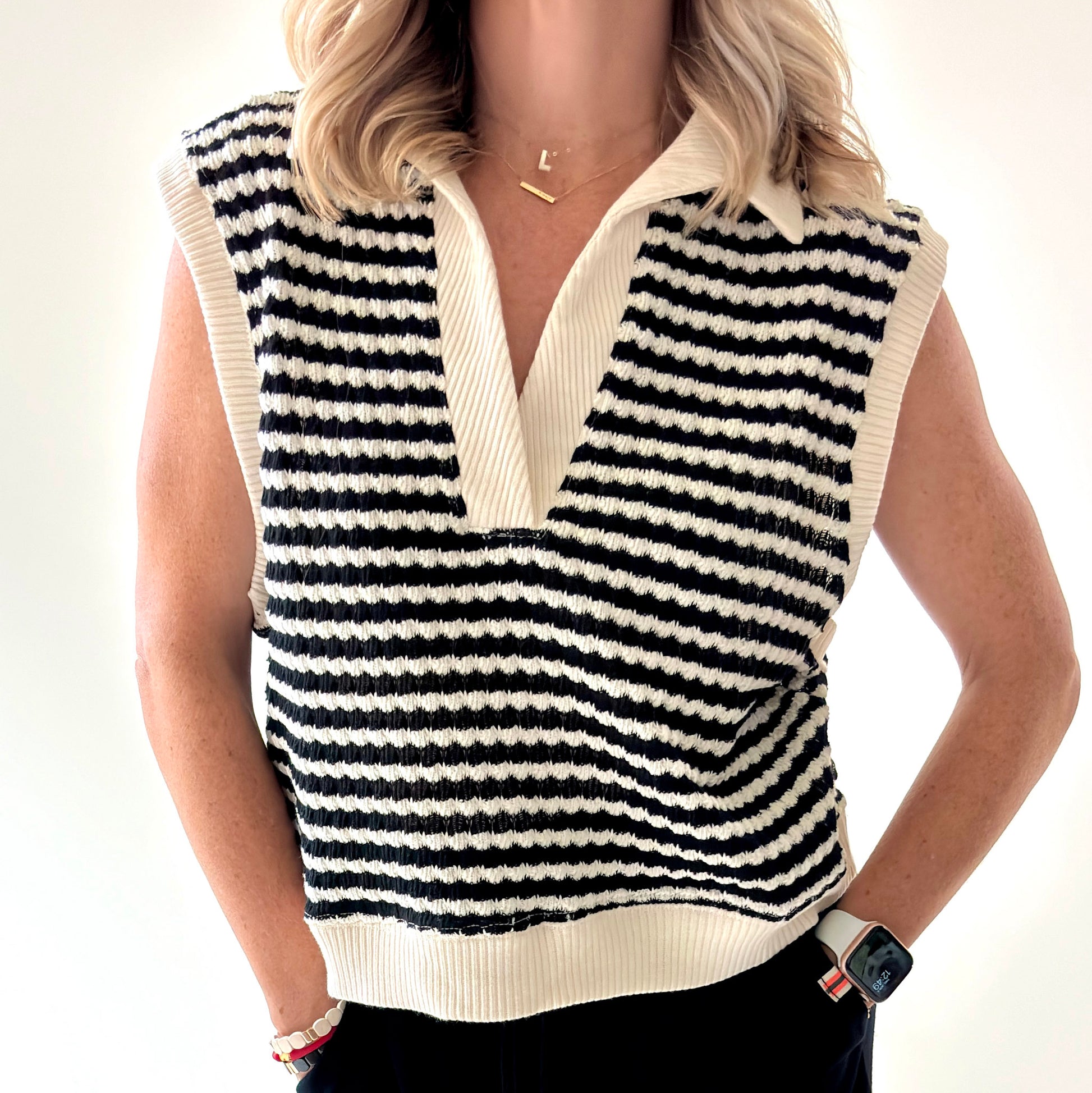 Black and ivory crochet textured sleeveless sweater vest
