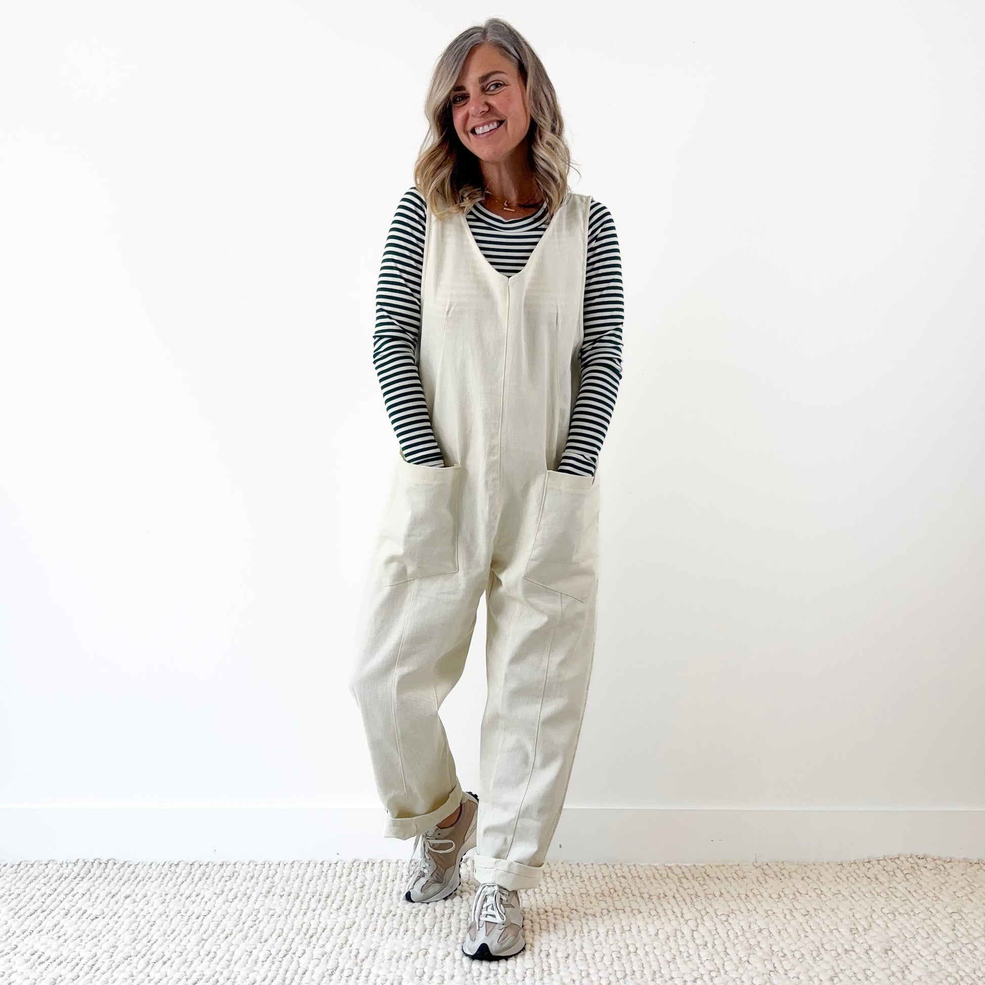 Women's Ivory Front Seam Pull on woven jumpsuit with front pockets