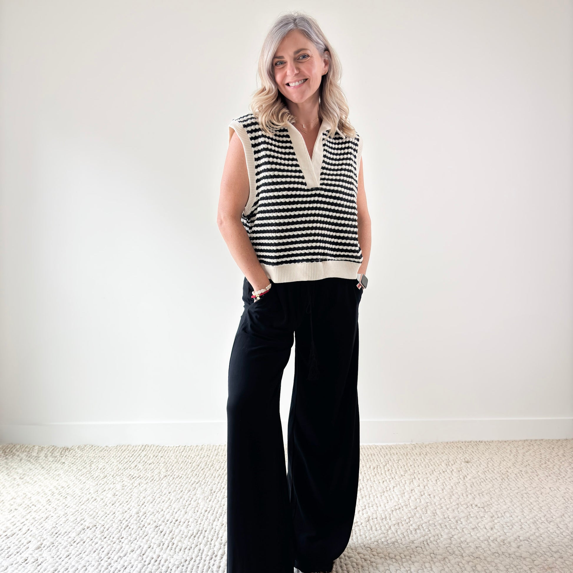 Black and ivory crochet textured sleeveless sweater vest
