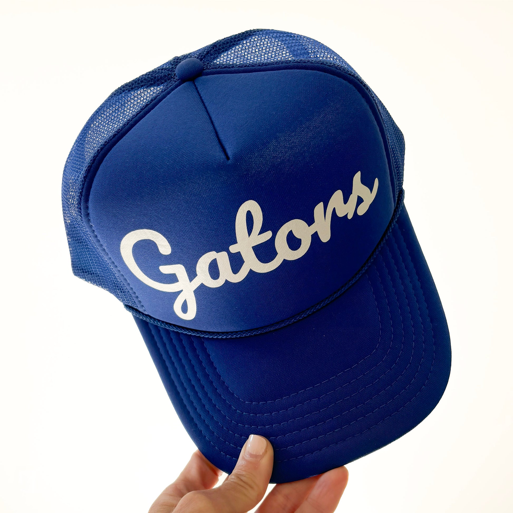 Women's blue snapback trucker hat with gators ivory pearl print