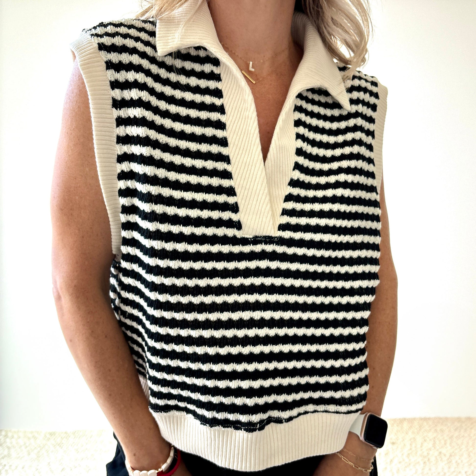 Black and ivory crochet textured sleeveless sweater vest