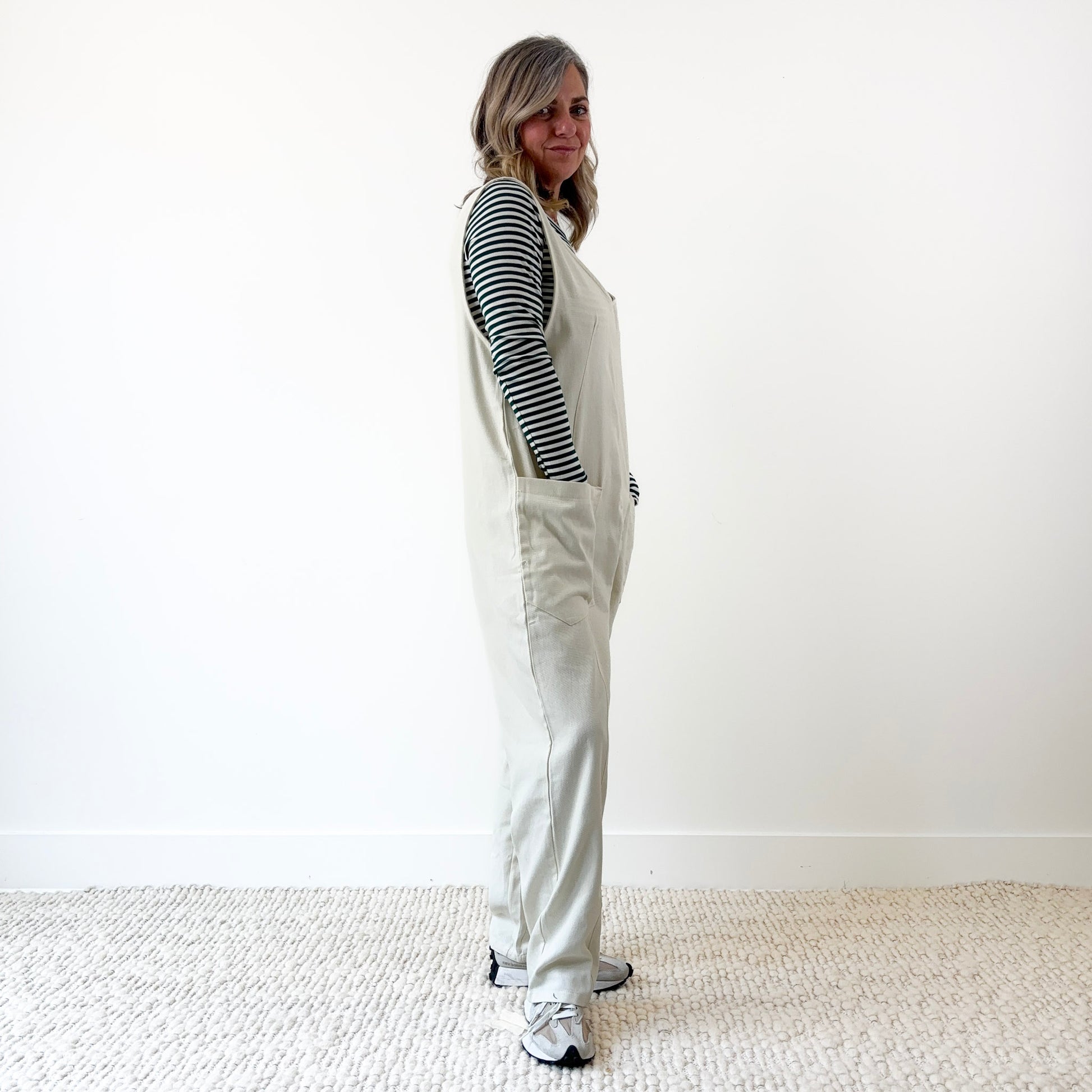 Women's Ivory Front Seam Pull on woven jumpsuit with front pockets