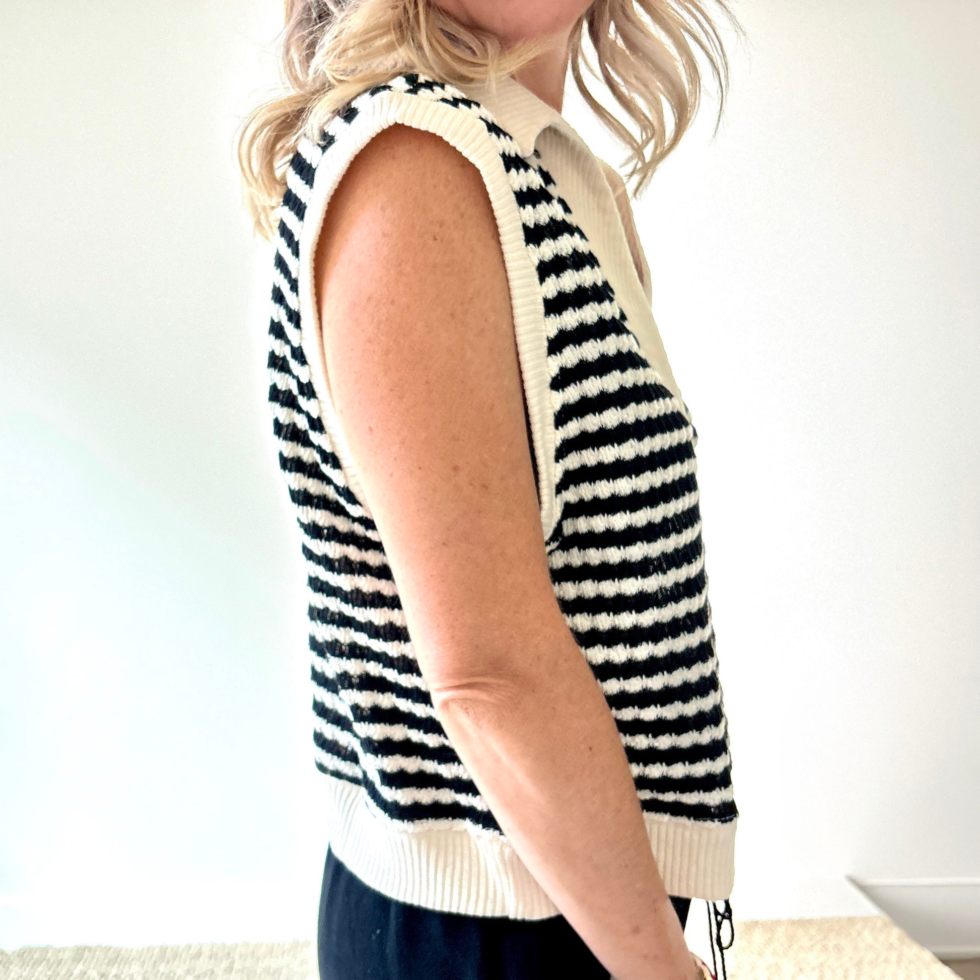 Black and ivory crochet textured sleeveless sweater vest