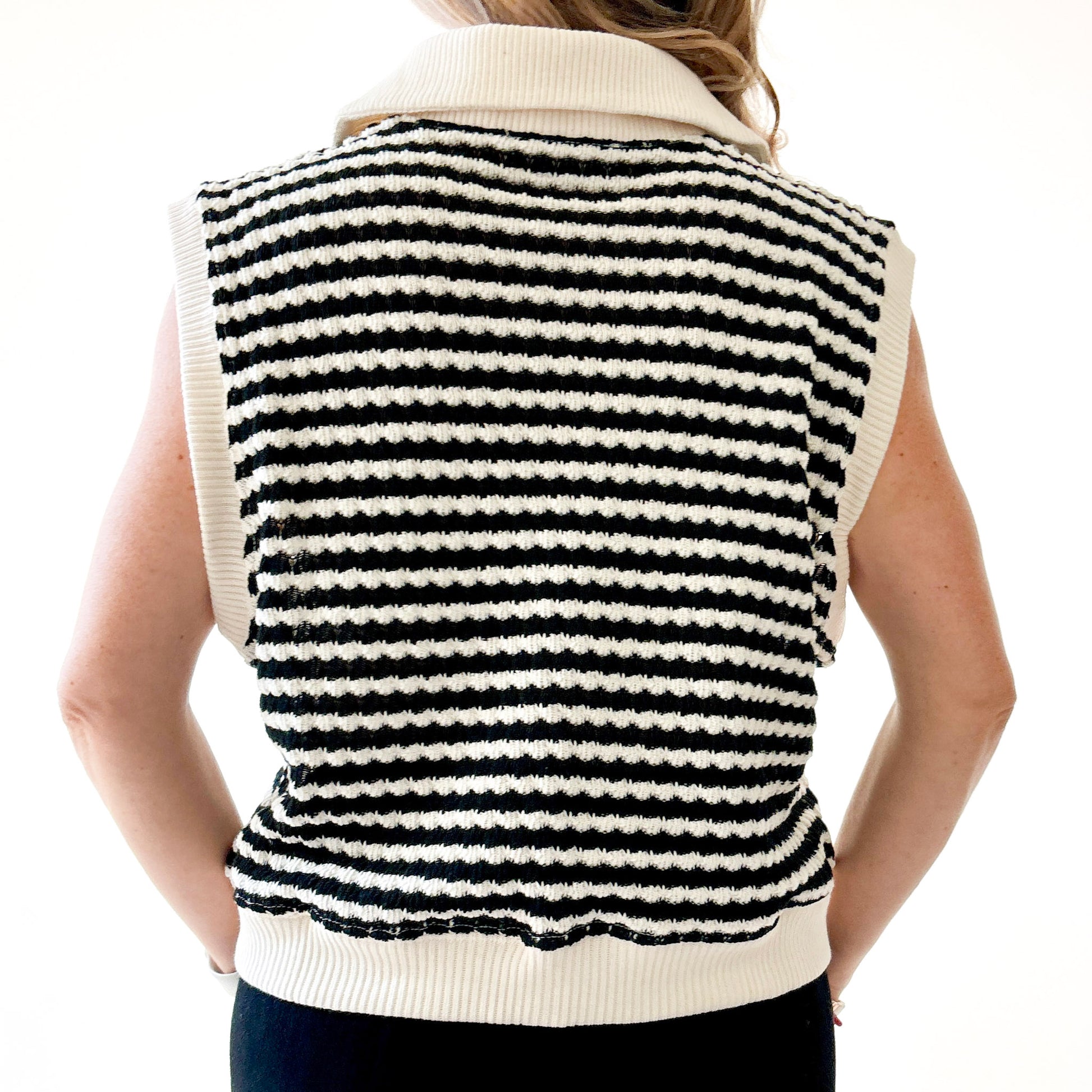 Black and ivory crochet textured sleeveless sweater vest