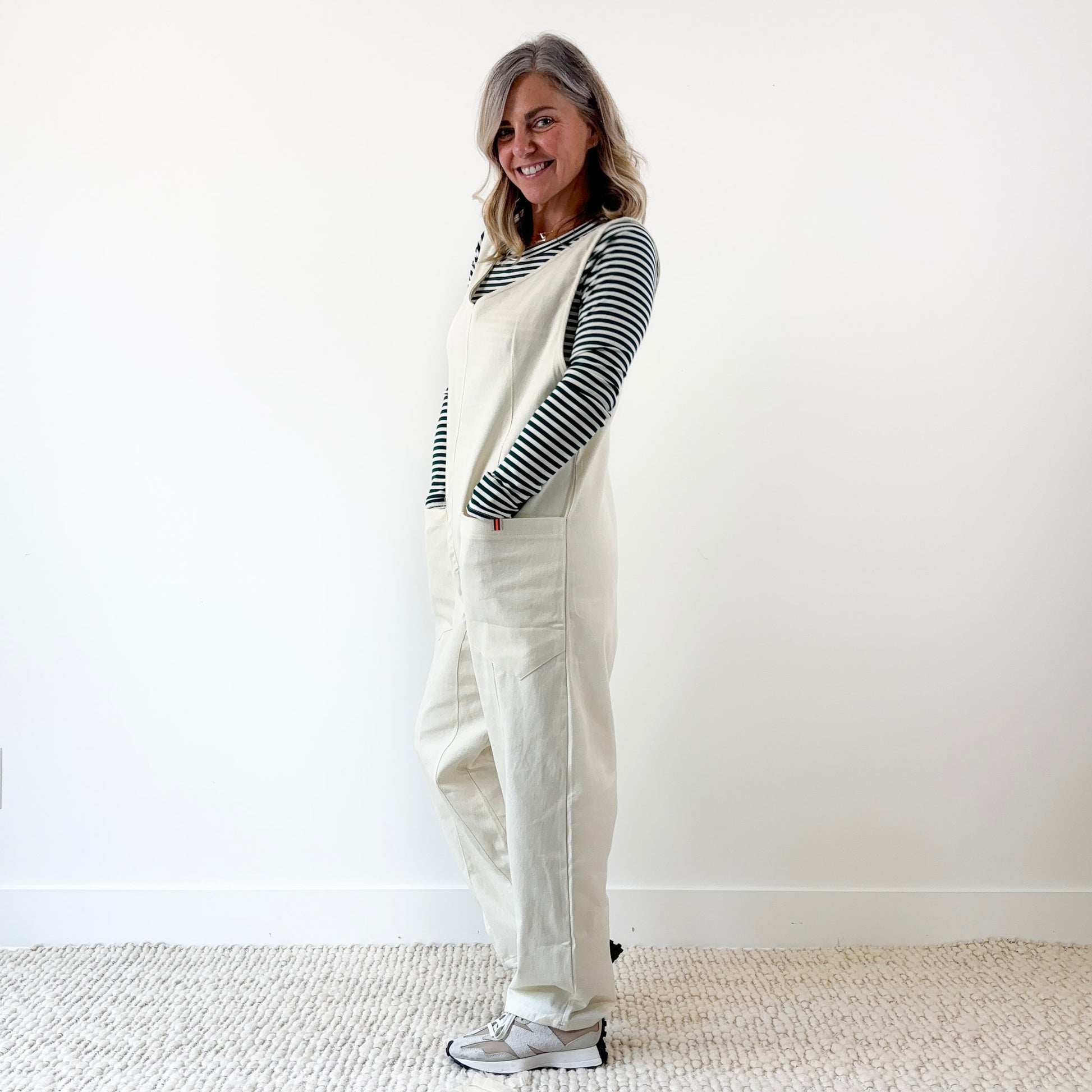 Women's Ivory Front Seam Pull on woven jumpsuit with front pockets