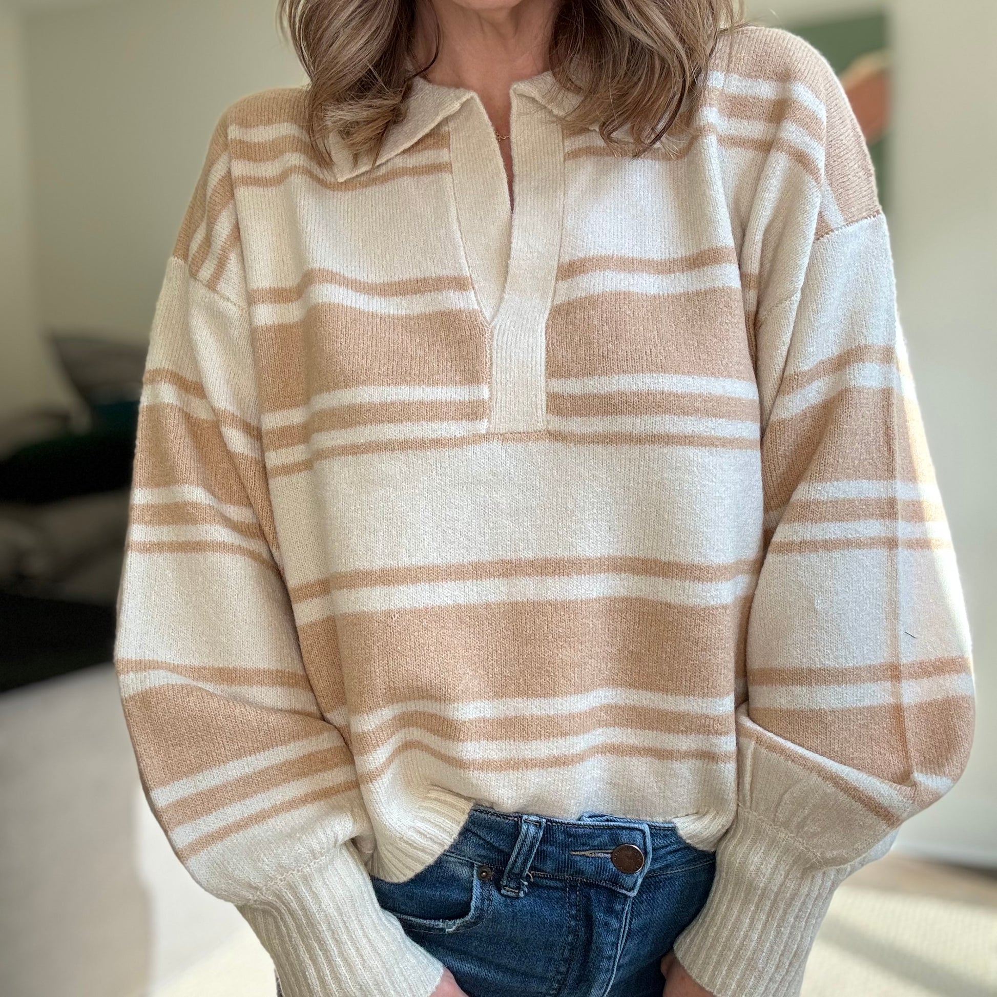 Tan and ivory striped polo collar sweater with balloon sleeve and rib cuff at wrists