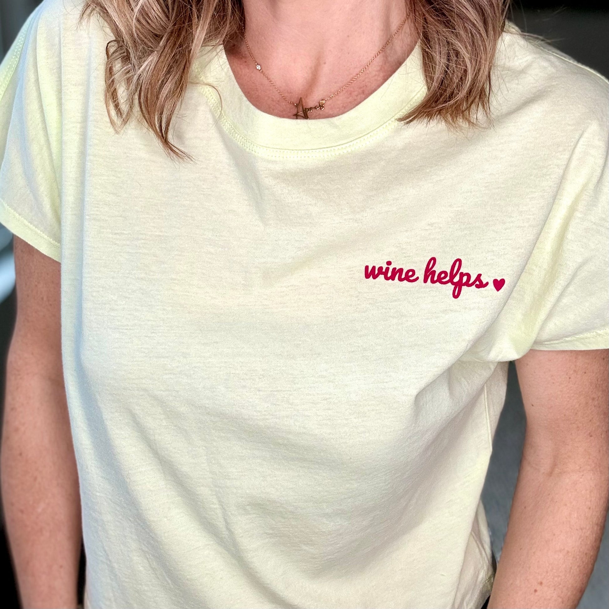 Lime green super soft short sleeve tee with bright pink wine helps left chest graphic