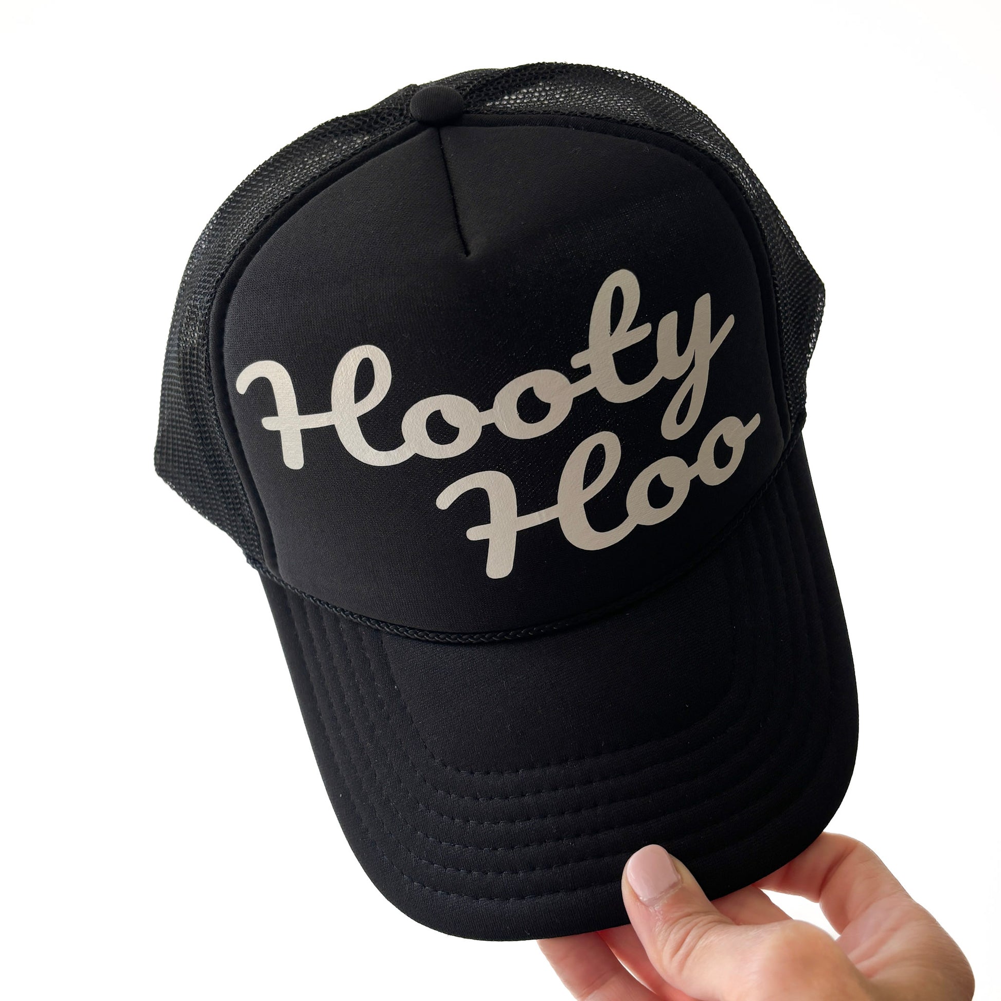 Black mid profile trucker hat with pearl script hooty hoo print