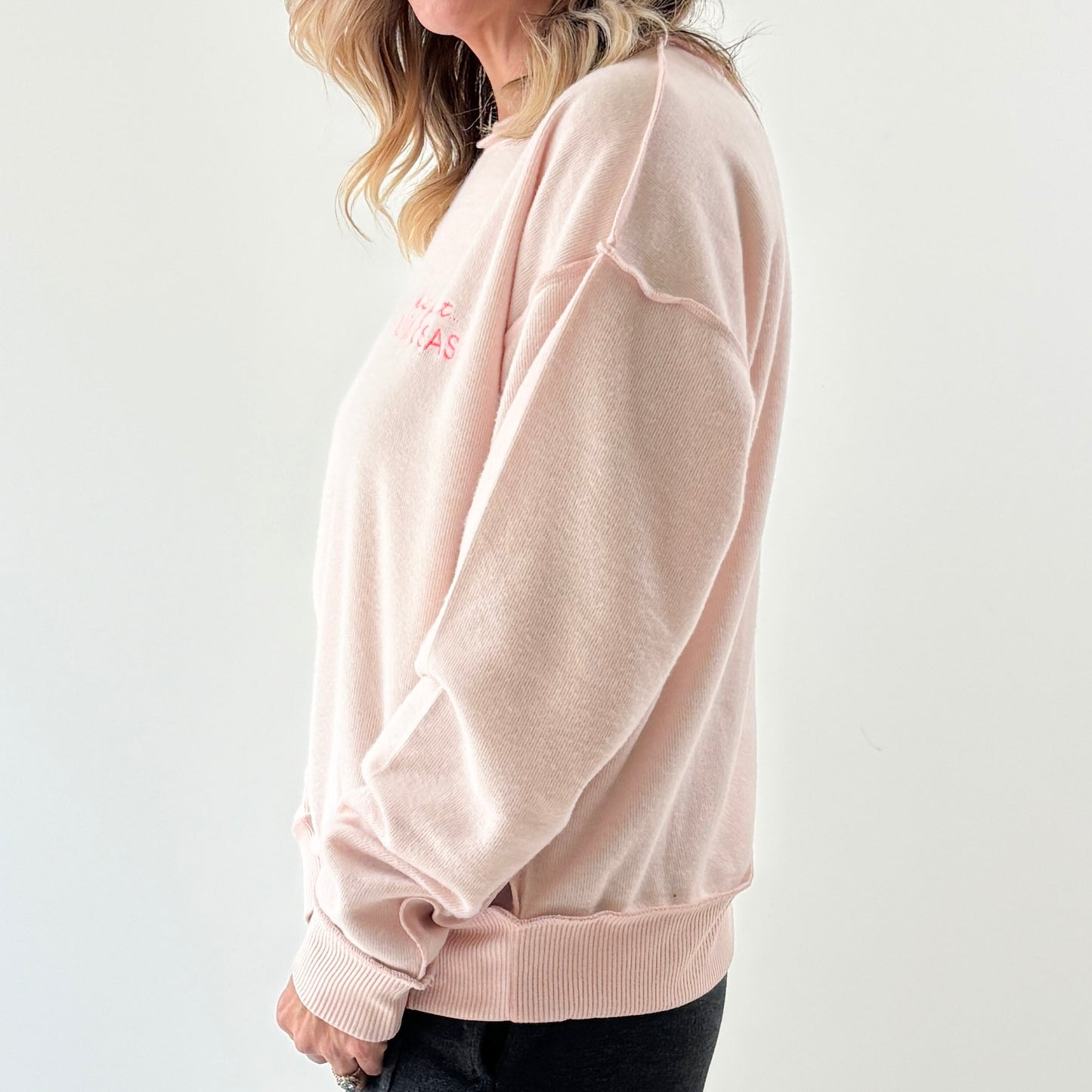 Women's light pink exposed seem crewneck sweatshirt with but first mimosas neon pink left chest embroidery