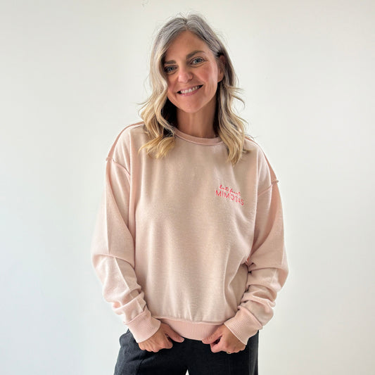 Women's light pink exposed seem crewneck sweatshirt with but first mimosas neon pink left chest embroidery