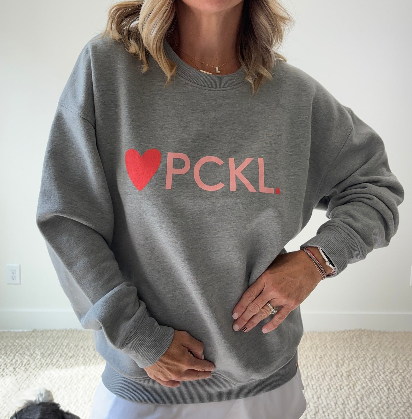 Women's heather gray classic crewneck fleece sweatshirt with pink heart PCKL pickleball screenprint