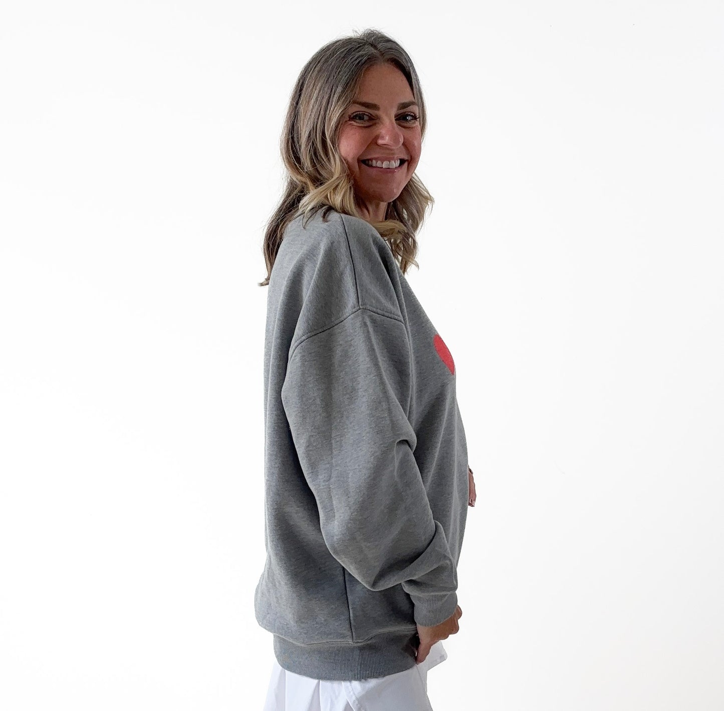 Women's heather gray classic crewneck fleece sweatshirt with pink heart PCKL pickleball screenprint