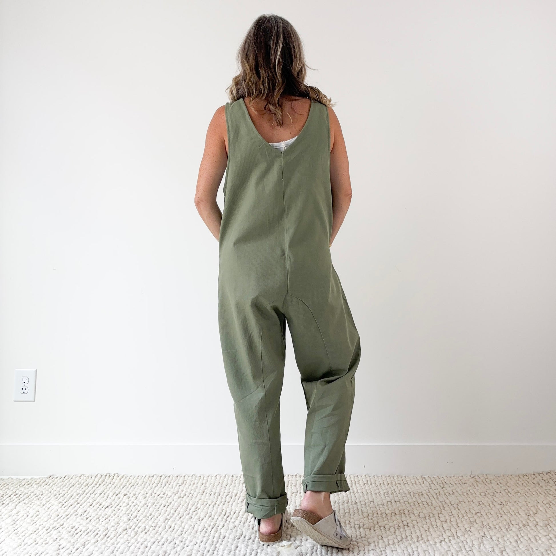 Women's Olive Front Seam Pull on woven jumpsuit with front pockets