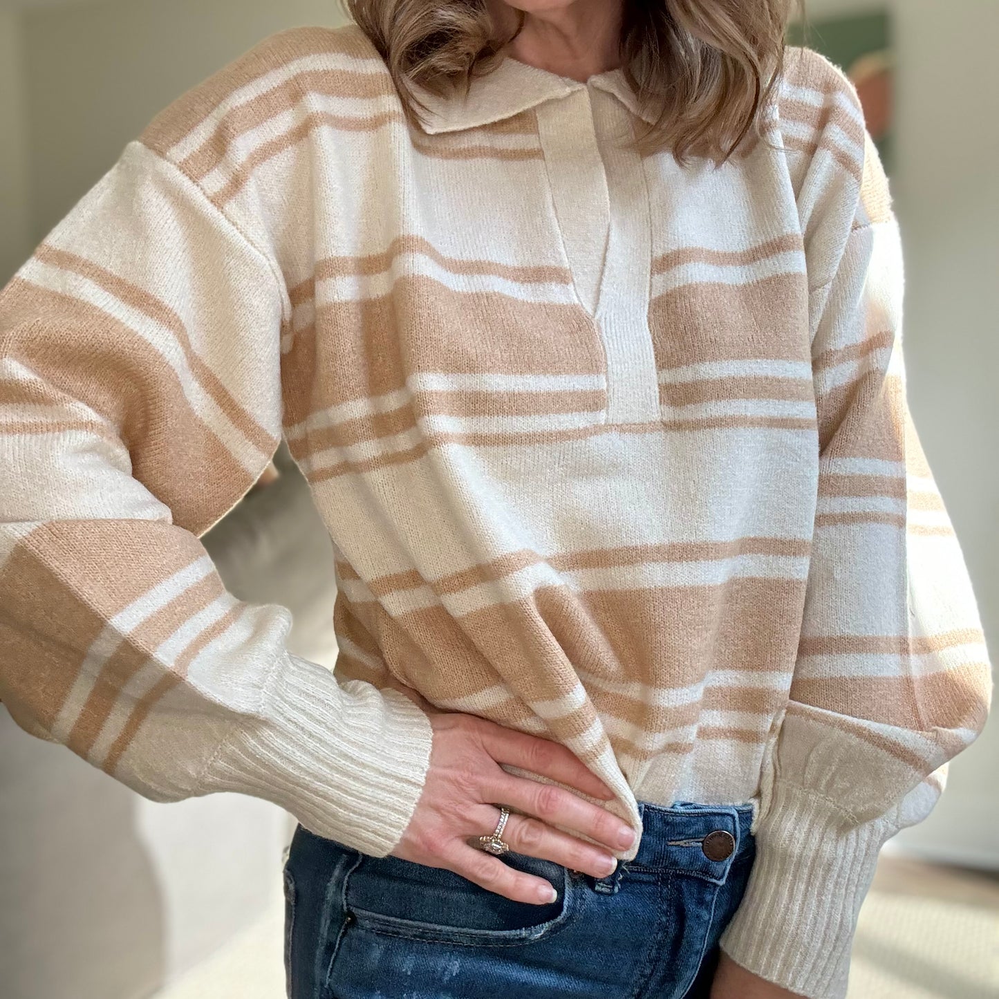 Tan and ivory striped polo collar sweater with balloon sleeve and rib cuff at wrists