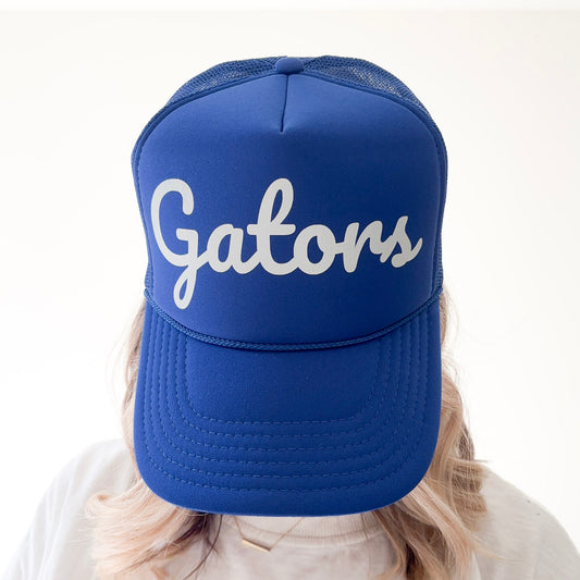 Women's blue snapback trucker hat with gators ivory pearl print