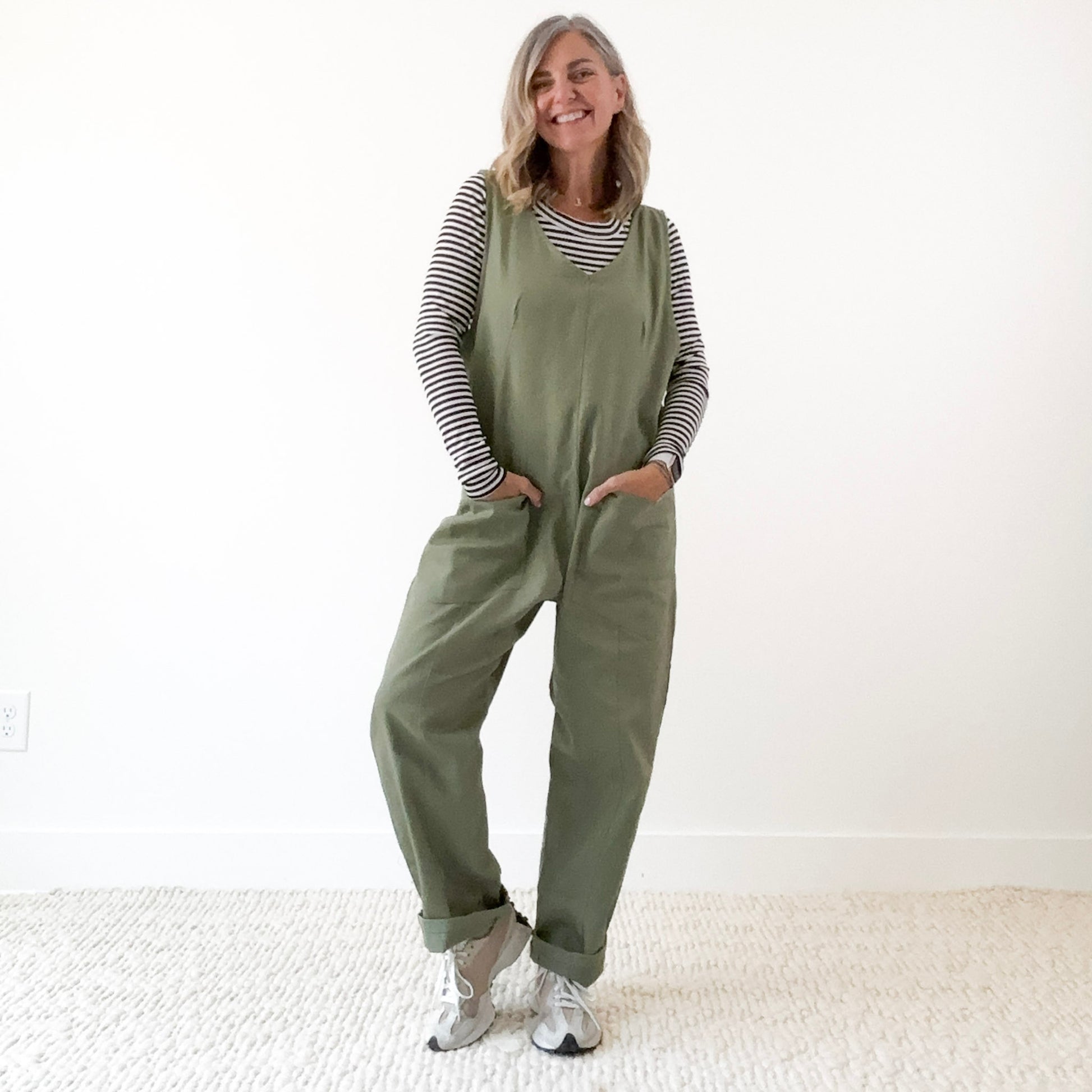 Women's Olive Front Seam Pull on woven jumpsuit with front pockets